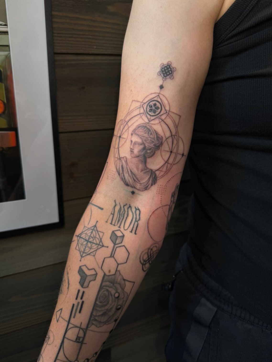 Tattoo by @mackmade.tattoos — geometric, black_and_grey
