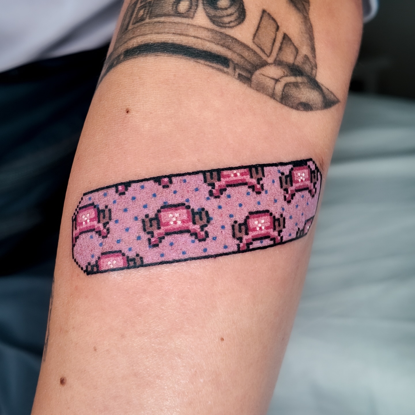 Bandaid dotwork tattoo on the forearm by m r p i x e l ๐ธ๐ฌ