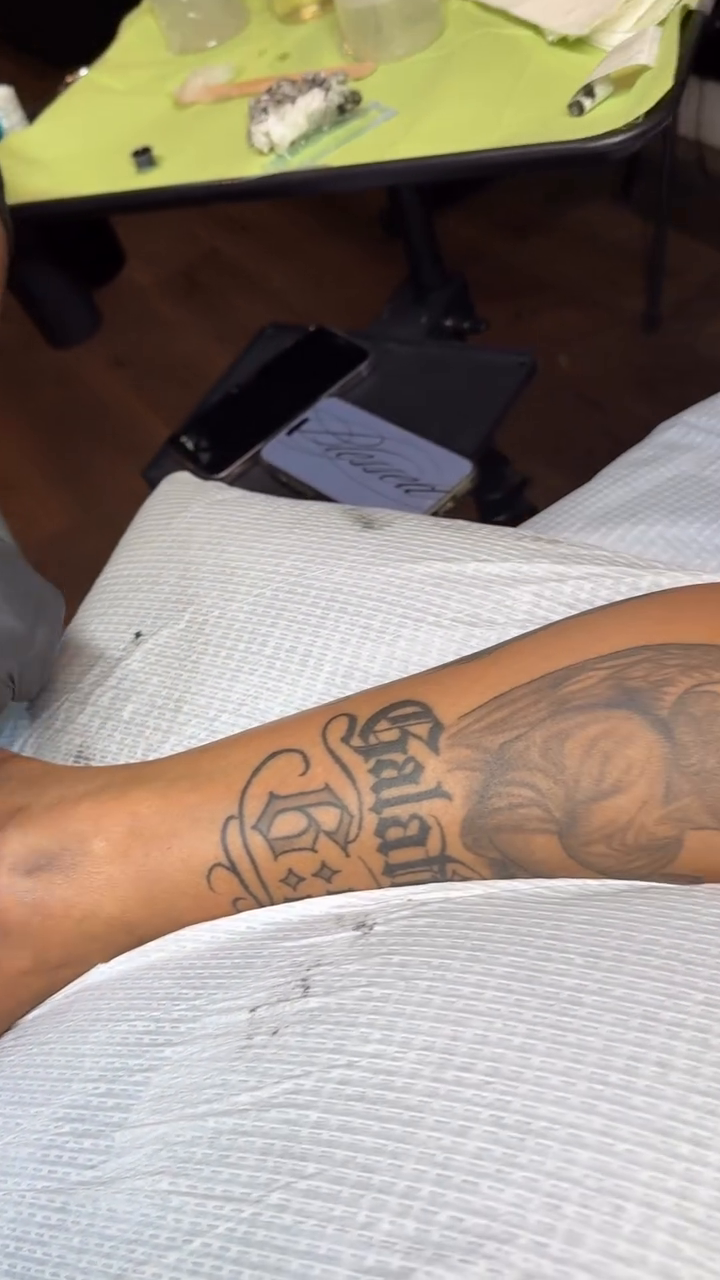 Galatians 5:22-23 tattoo on leg lettering tattoo on the upper arm by @getmoneetattz