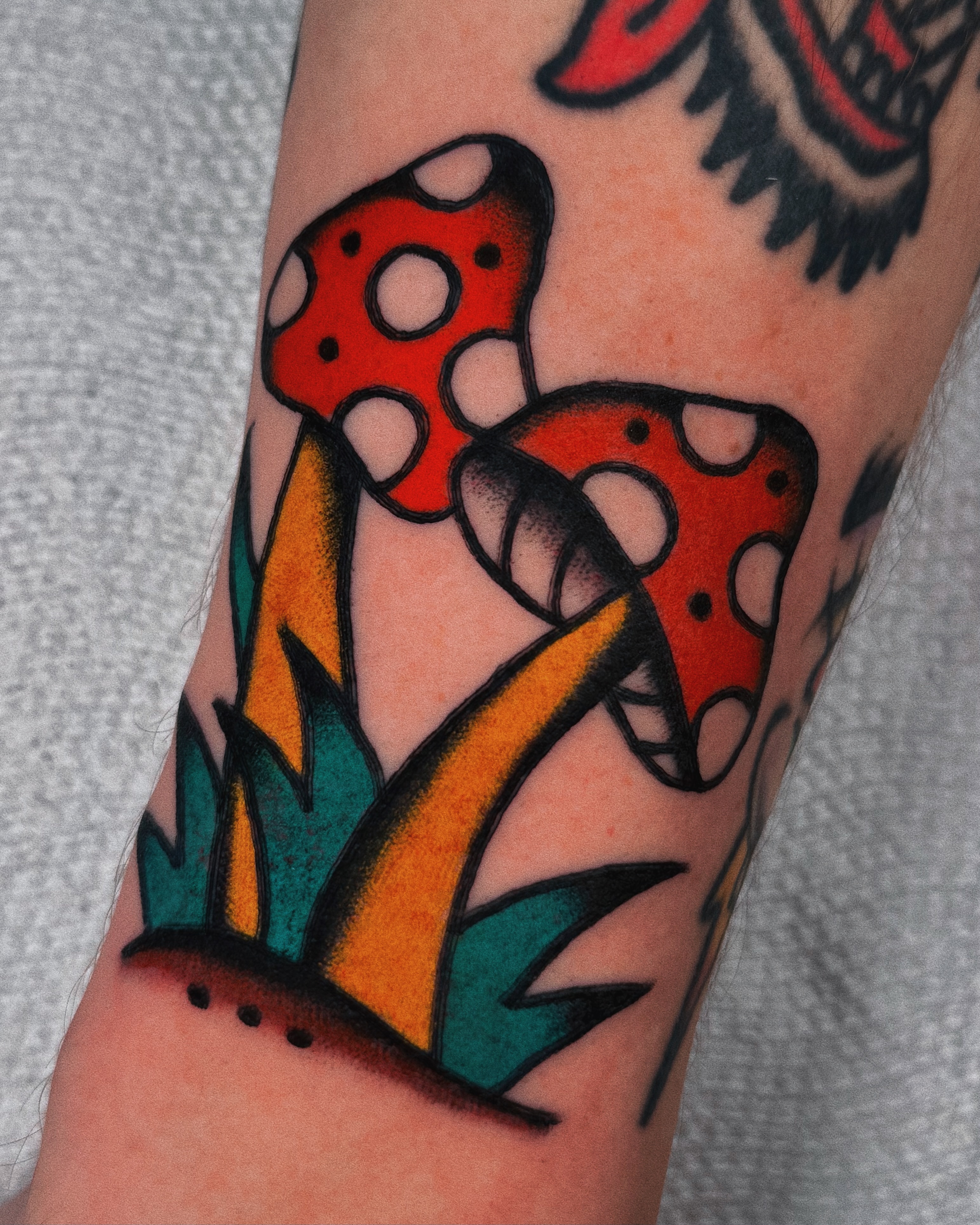 Mushroom American traditional tattoo on the forearm by Sean Michel, Nashua, New Hampshire