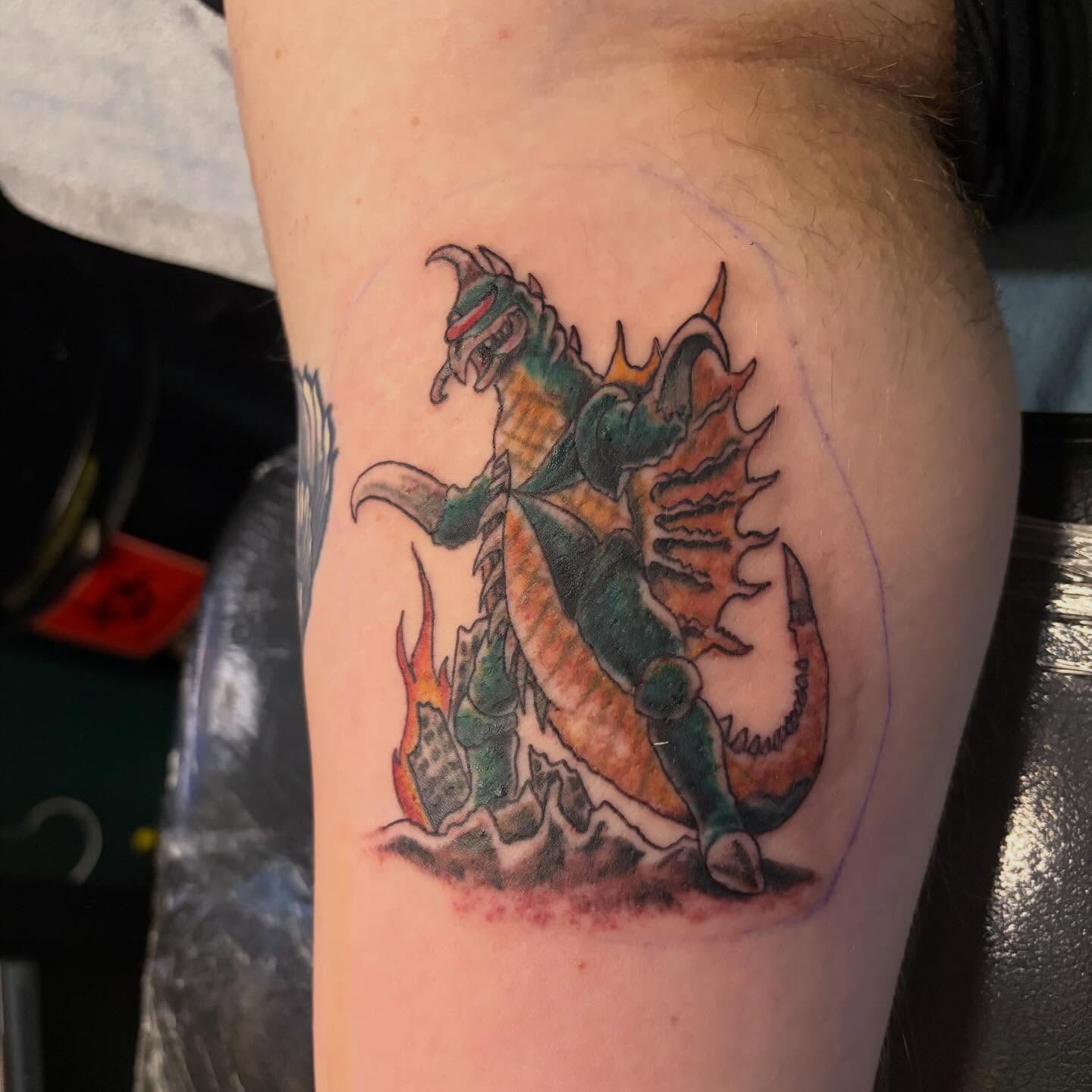Dragon American traditional tattoo on the thigh by Fredrick Tigerman