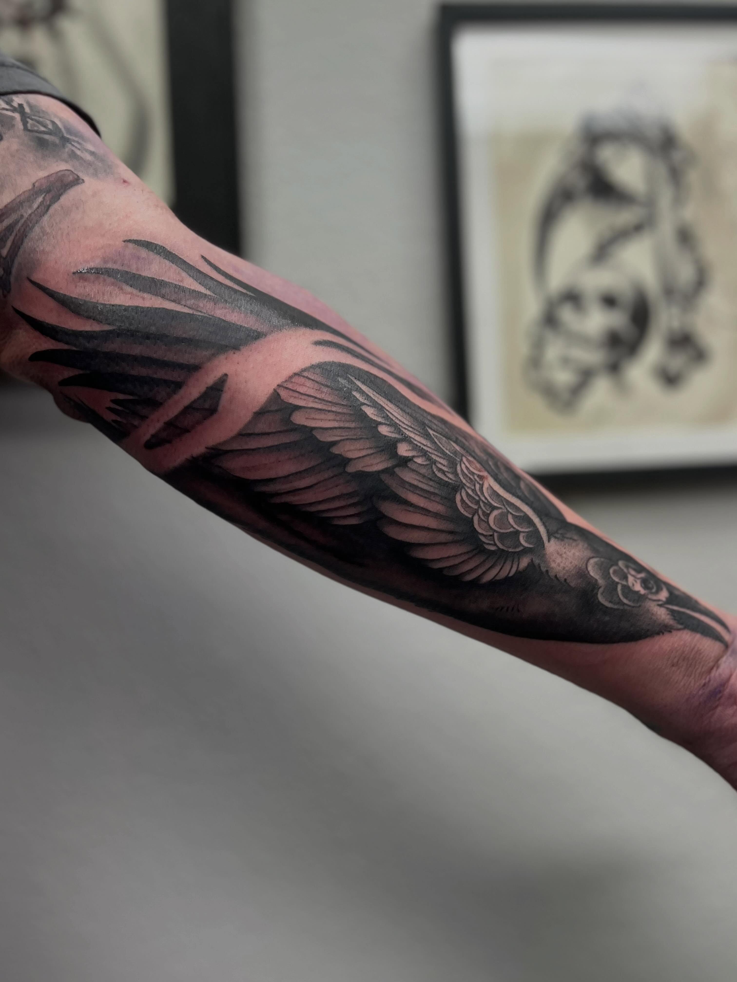 Wings black and grey tattoo on the forearm by Rebecca Kern Tattoos