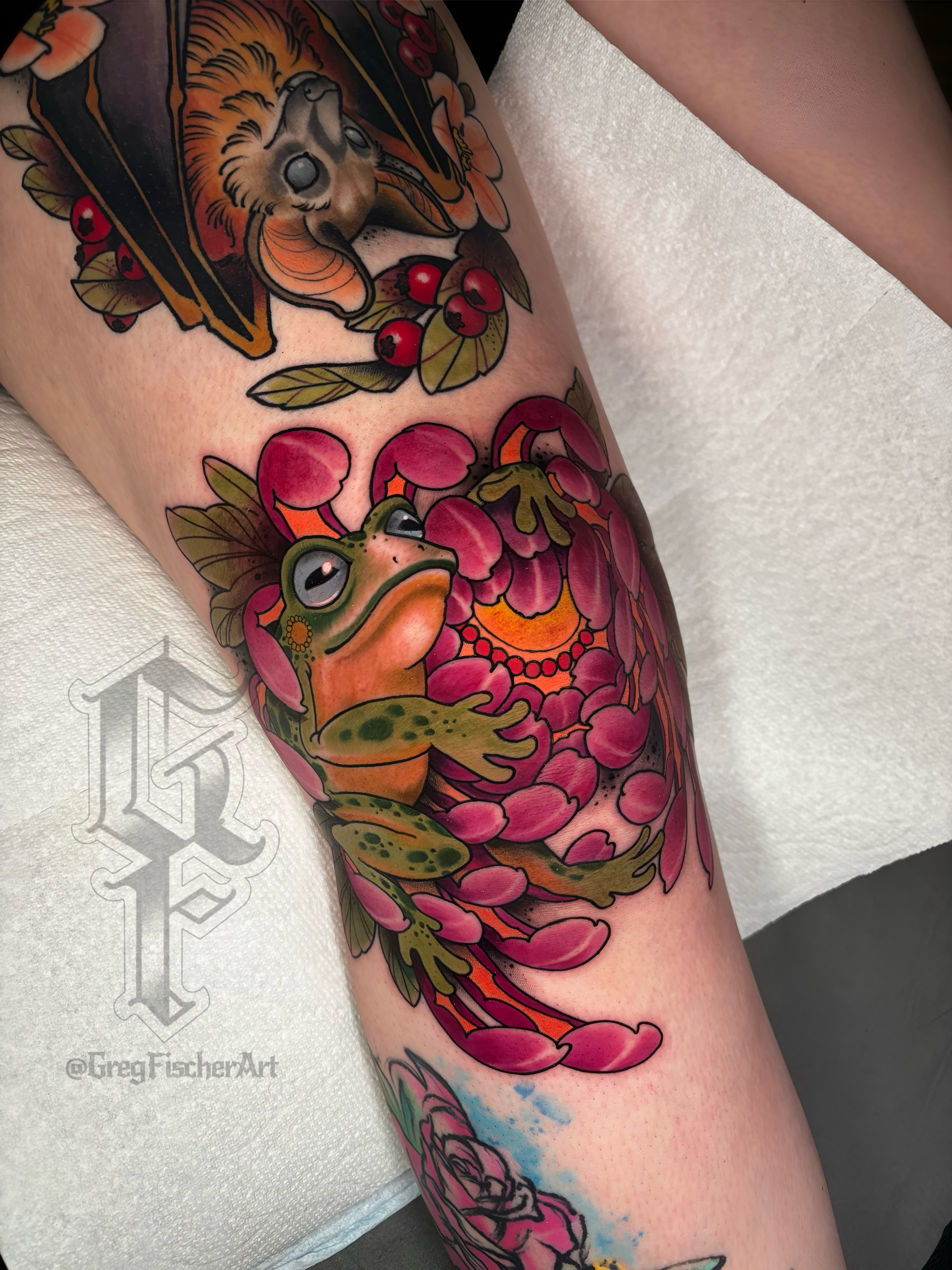 Frog and flowers American traditional tattoo on the forearm by Greg Fischer
