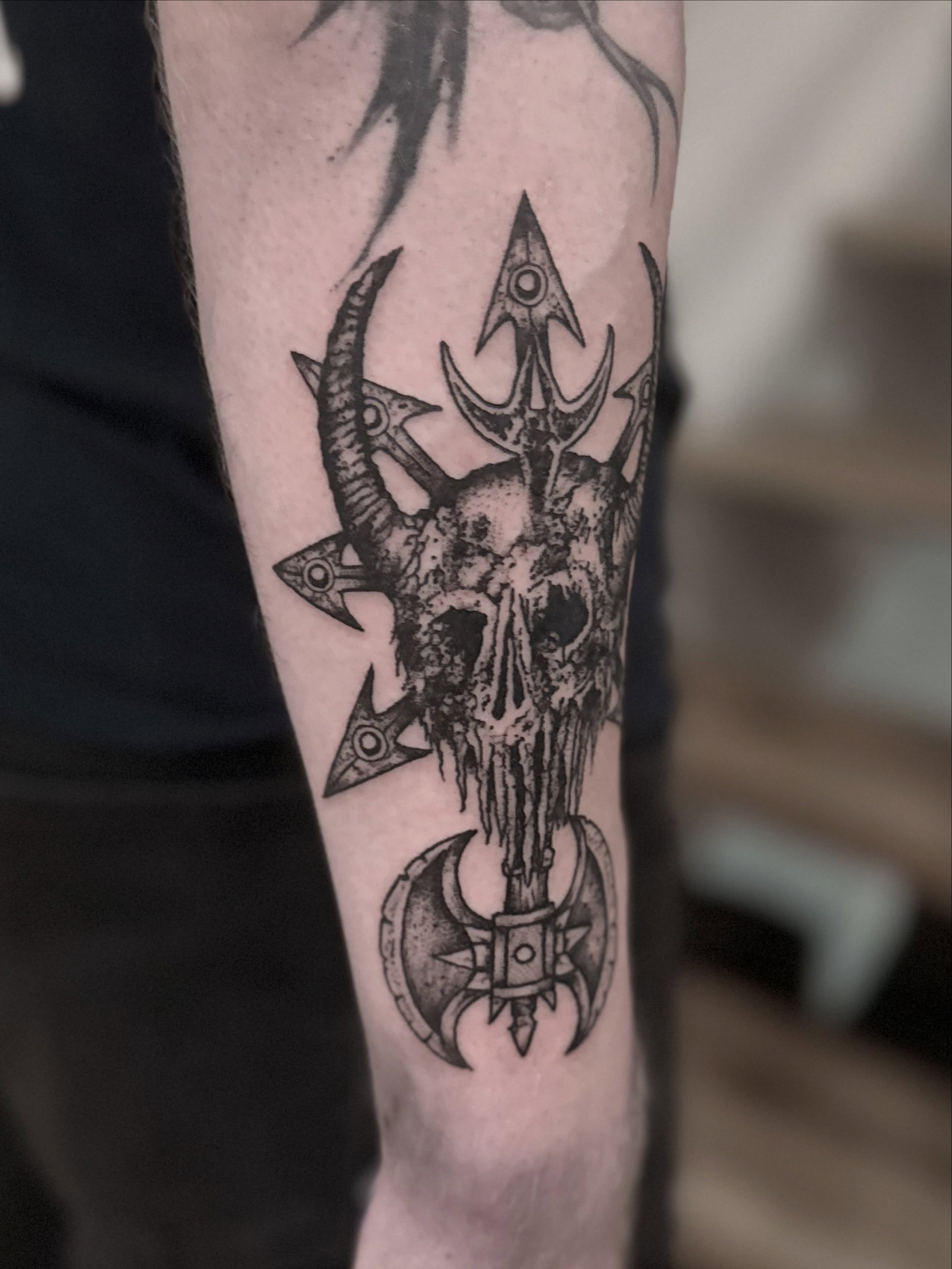 Skull with trident dark realism tattoo on the forearm by Tattoo Artist, Philadelphia, Pennsylvania