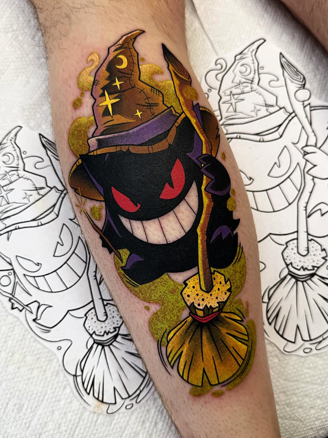 Gengar wizard with broom new school tattoo on the forearm by Bold Anime Tattoos