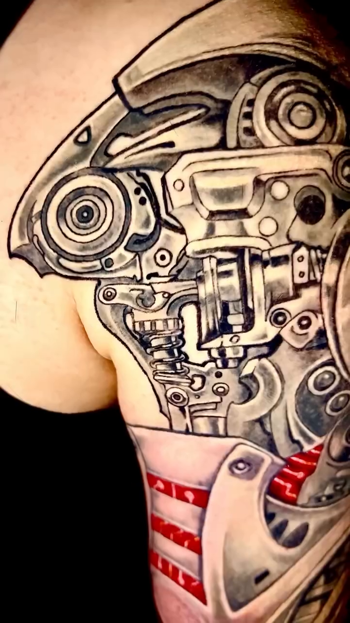 Biomechanical robot arm tattoo biomech tattoo on the upper arm by Kayden DiGiovanni, Addison, Texas