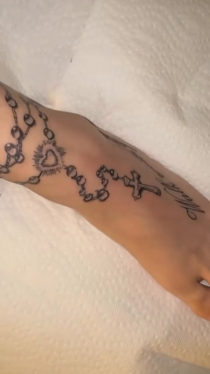 Blackwork tattoo on the foot by Comet