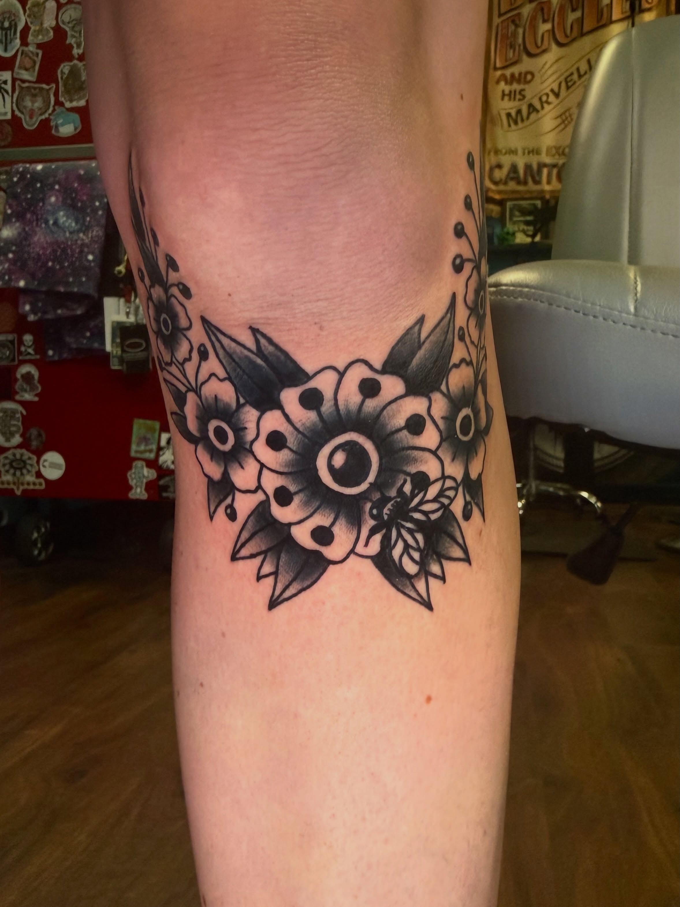 Floral arrangement black and grey tattoo on the thigh by π Erin Stephens π€