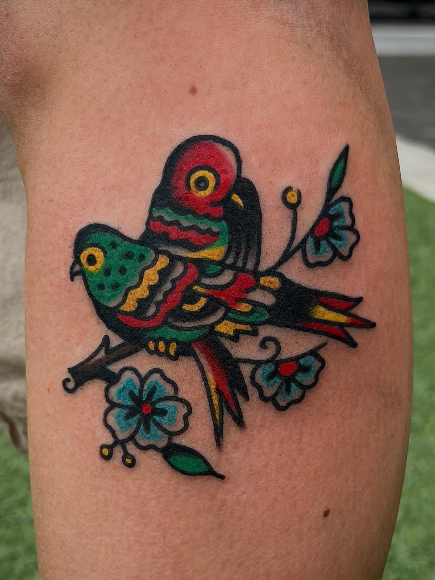 Birds and flowers American traditional tattoo on the thigh by Jared Allen, Saint Petersburg, Florida