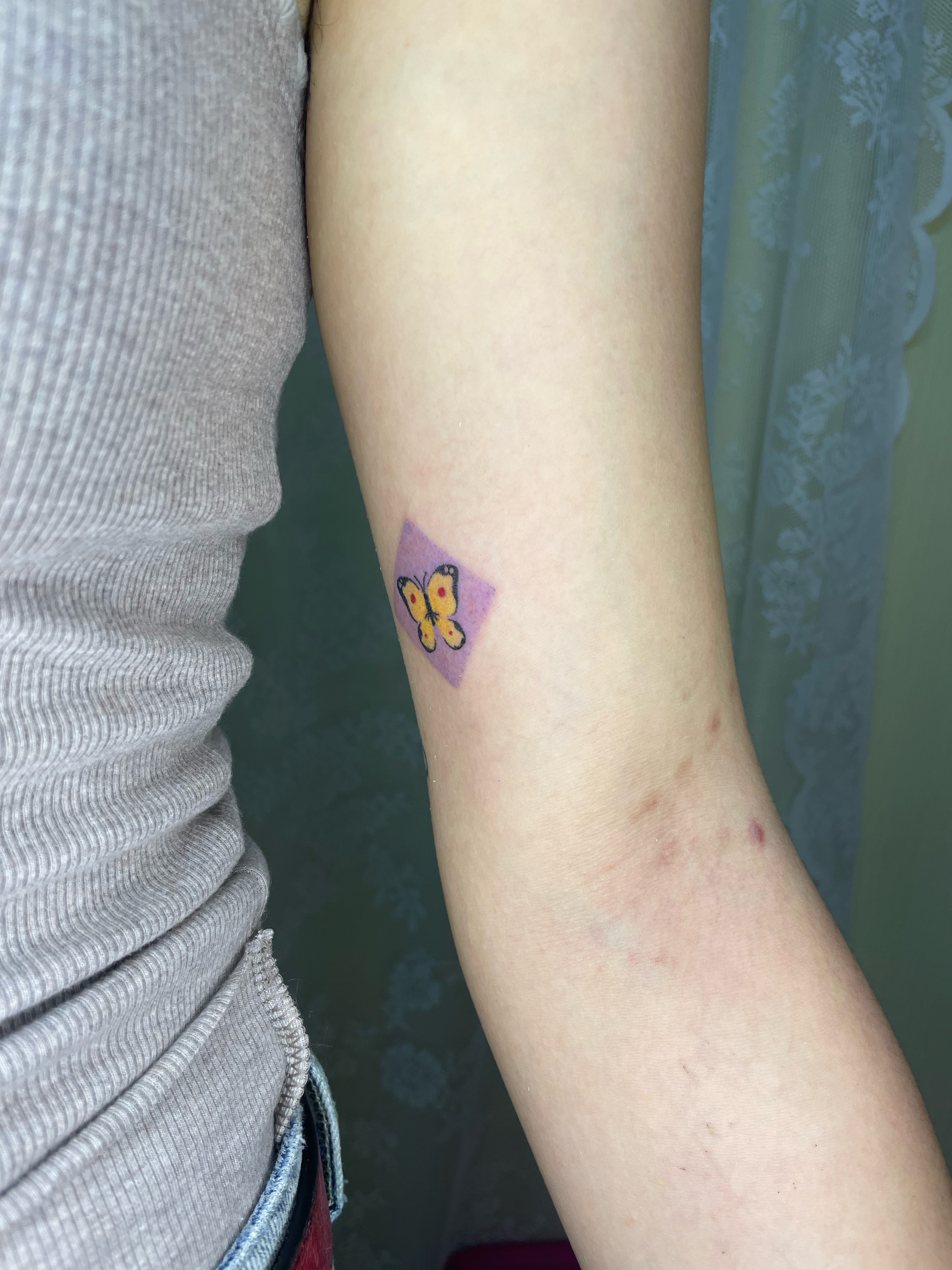 Butterfly dotwork tattoo on the forearm by cait