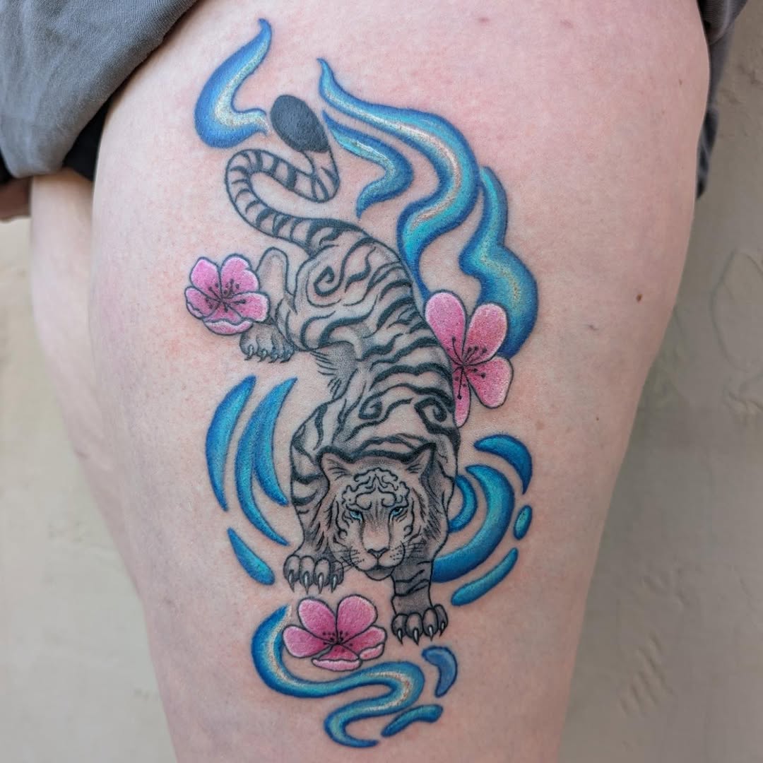 Tiger with flowers realism tattoo on the thigh by Raven FM-Tattoo Apprentice