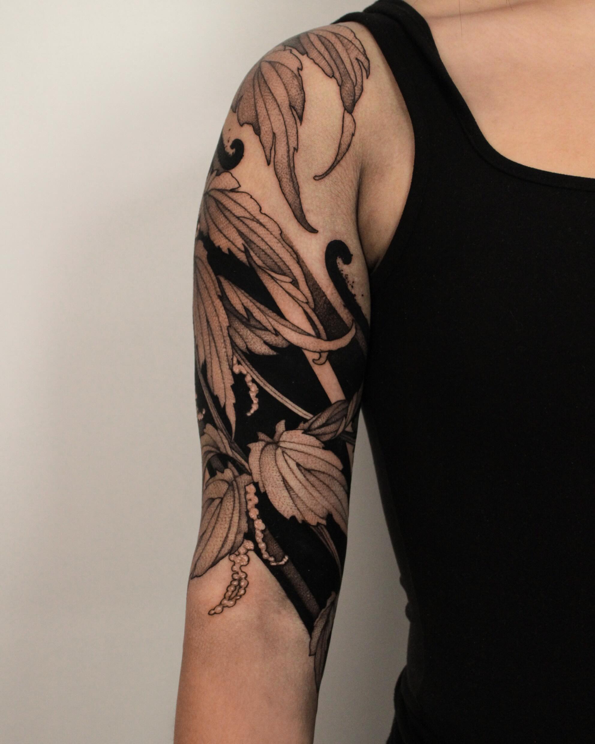 Floral vine black and grey tattoo on the forearm by Heather Apgar