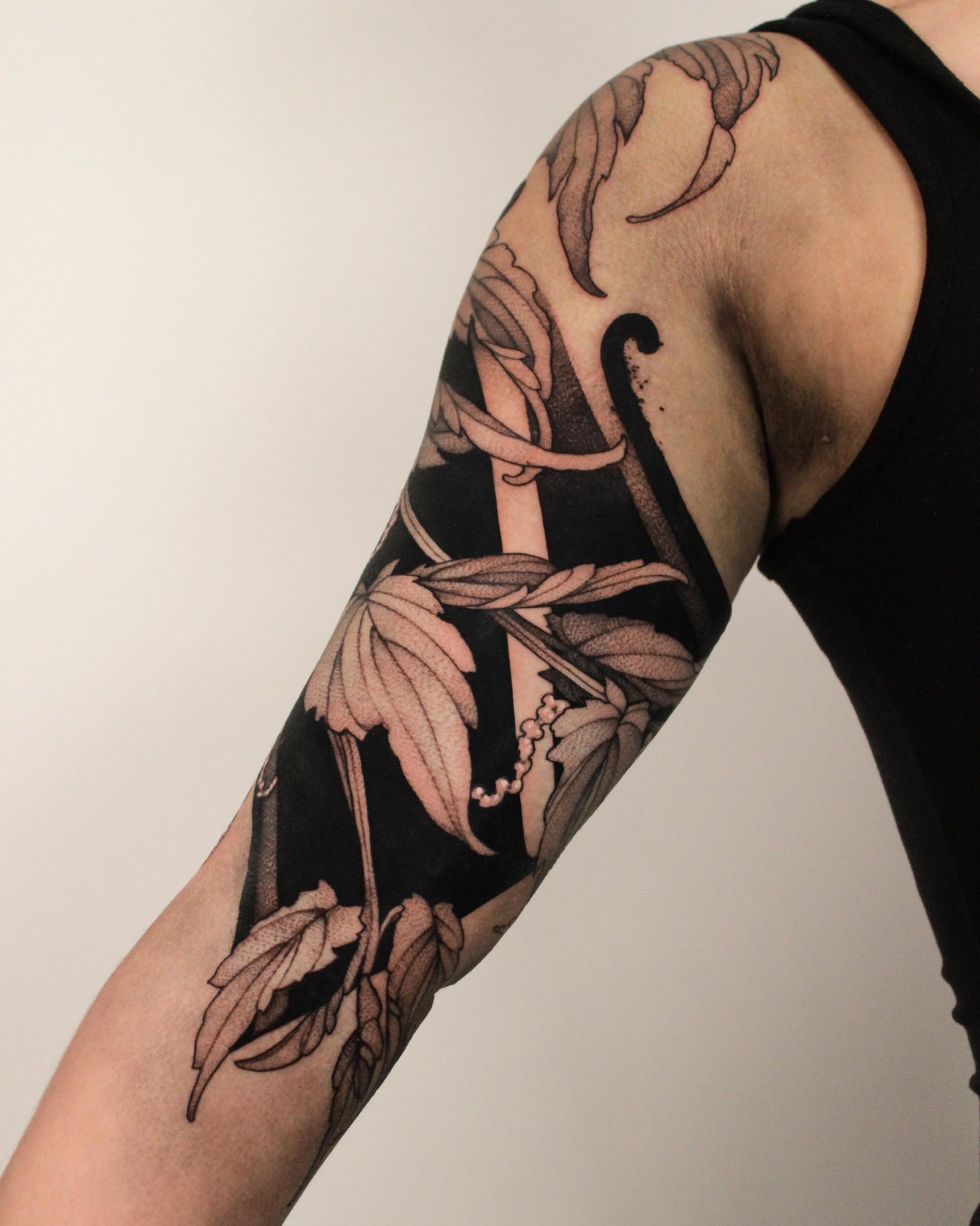 Leaves and vines realism tattoo on the forearm by Heather Apgar