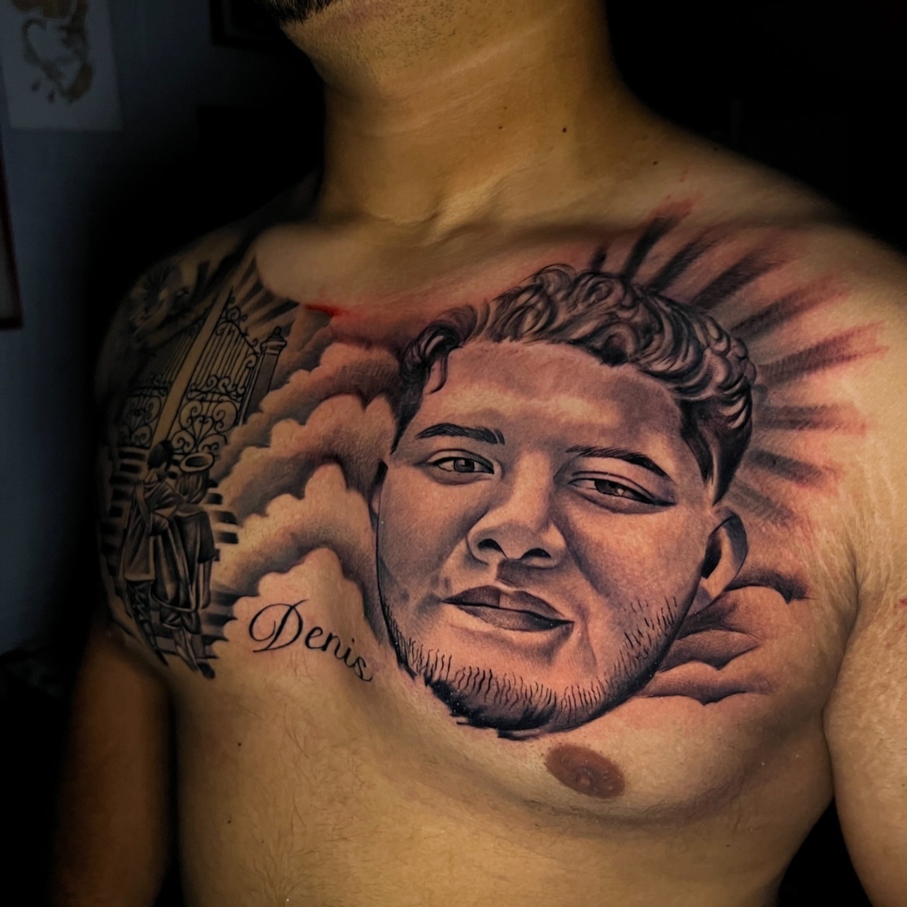 Portrait realism tattoo on the chest by El Salvador Tattoo Artist