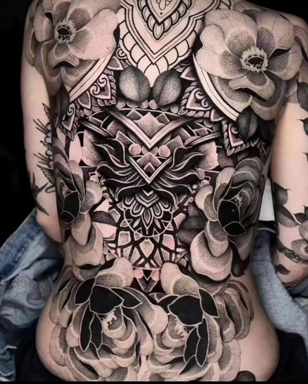 Full back floral and mandala geometric tattoo on the torso by miami tattoo artist