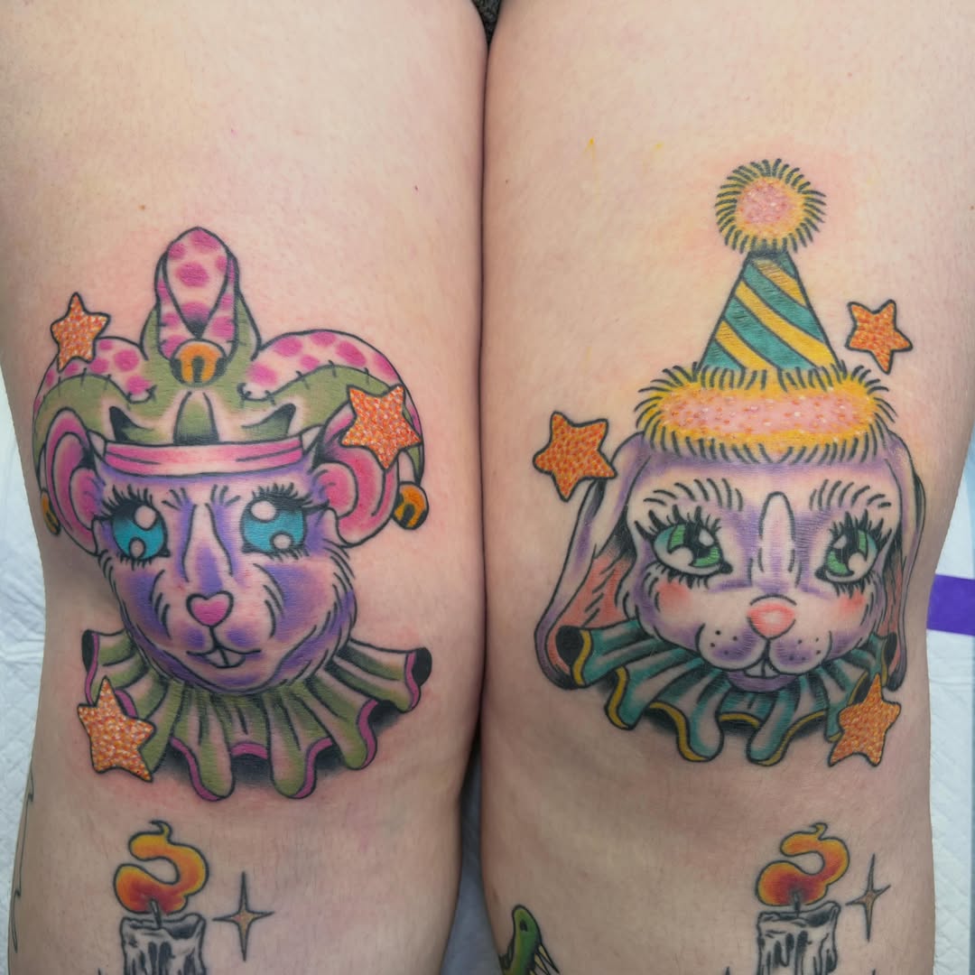 Clown cat American traditional tattoo on the thigh by Hailey Hermosillo