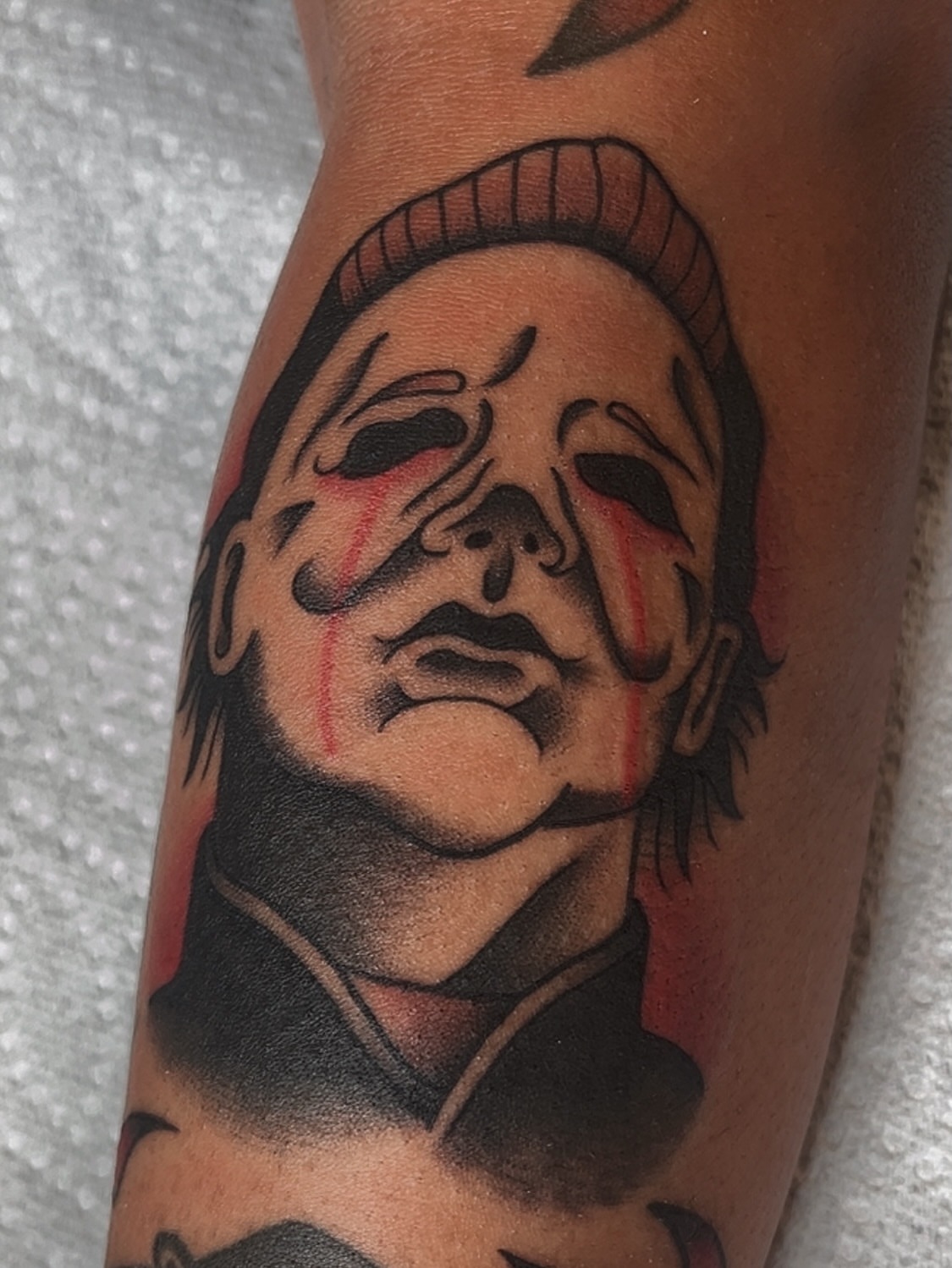 Michael Myers mask American traditional tattoo on the forearm by Las Vegas Tattoo Artist