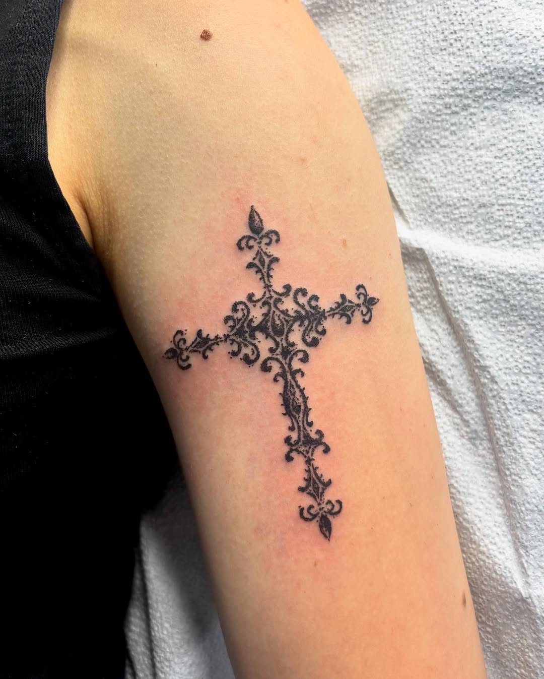Ornate cross ornamental tattoo on the forearm by kendle
