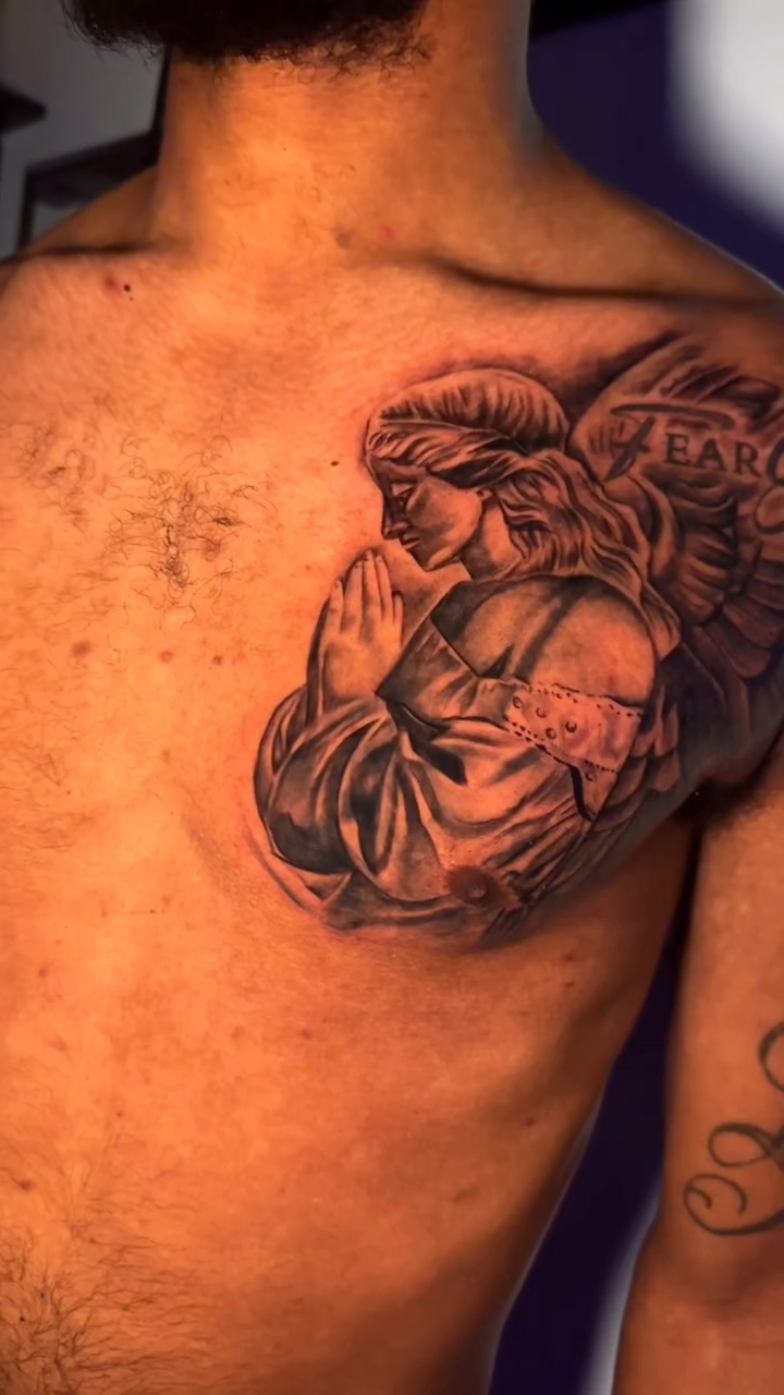 Praying angel realism tattoo by Tattoo Artist