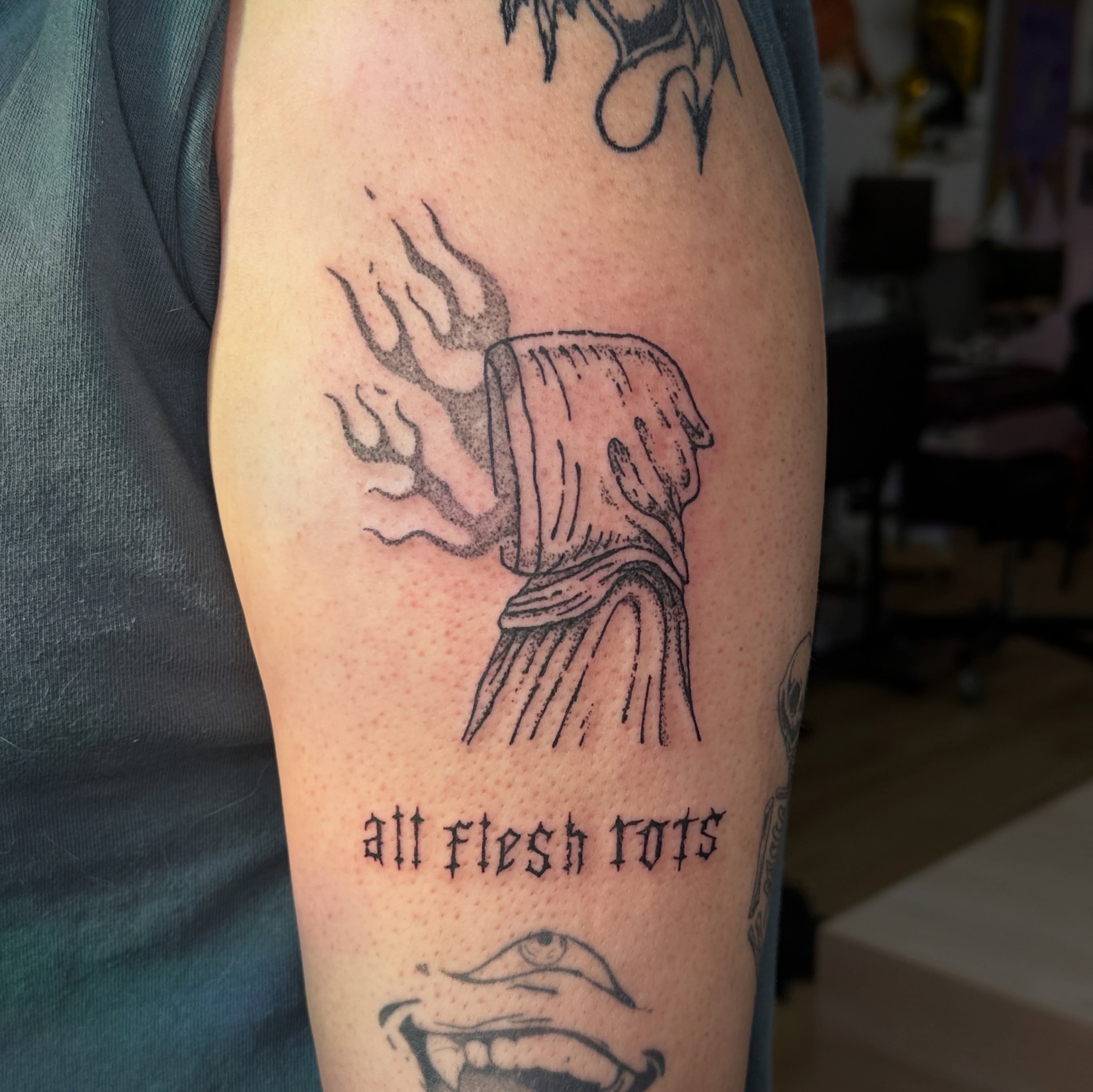 Burning cloth dotwork tattoo on the forearm by Fleur ๐ฅ