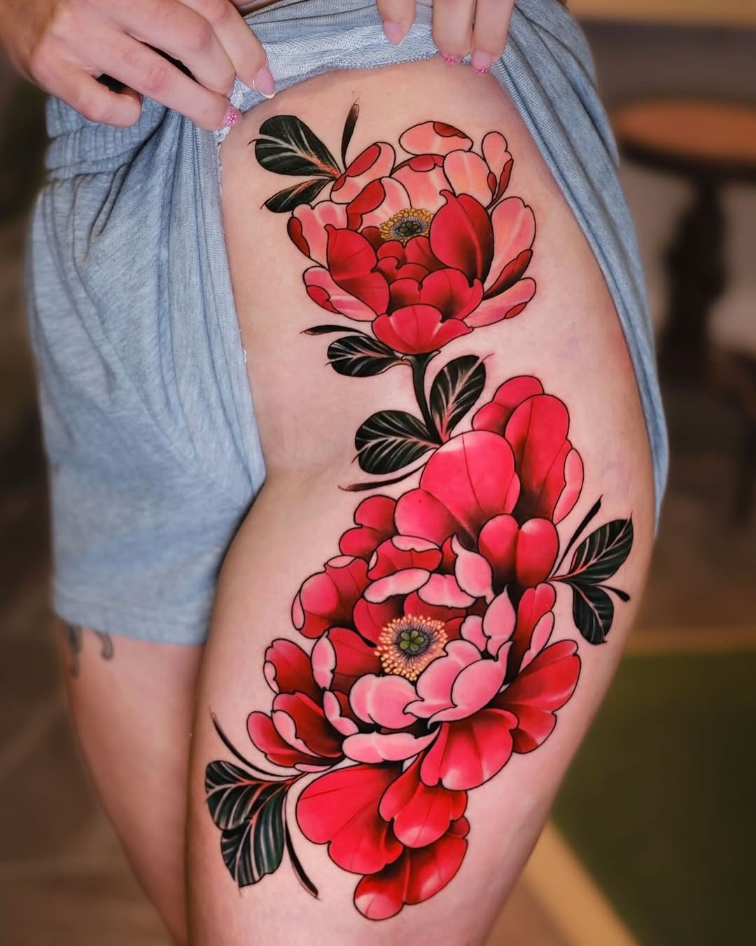 Peonies neo-traditional tattoo on the thigh by Andres Acevedo, Denver, Colorado