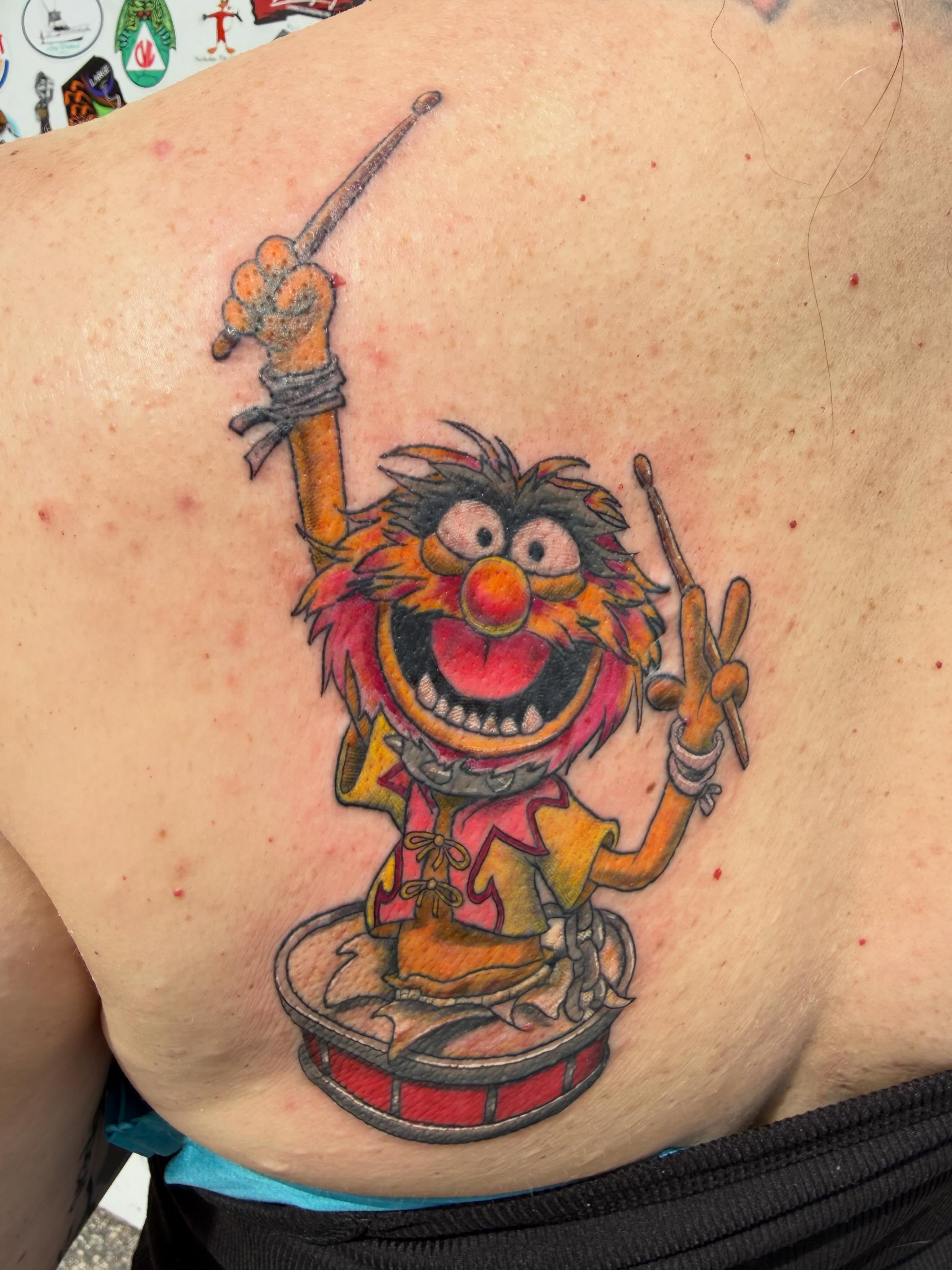 Animal drummer new school tattoo on the back by Matthew Humphrey, Pawcatuck, Connecticut