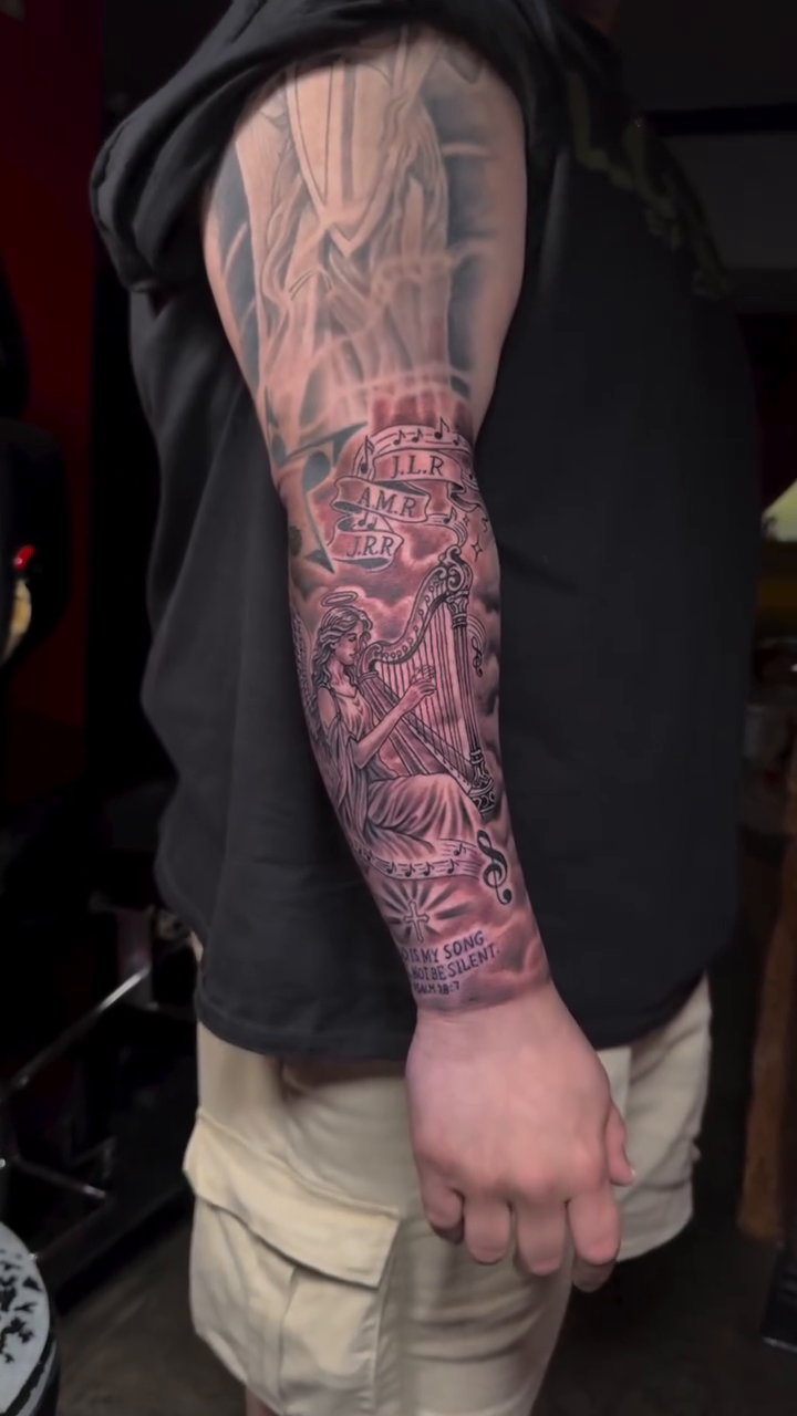 Realism tattoo on the upper arm by InkbyEase, Wayne, New Jersey