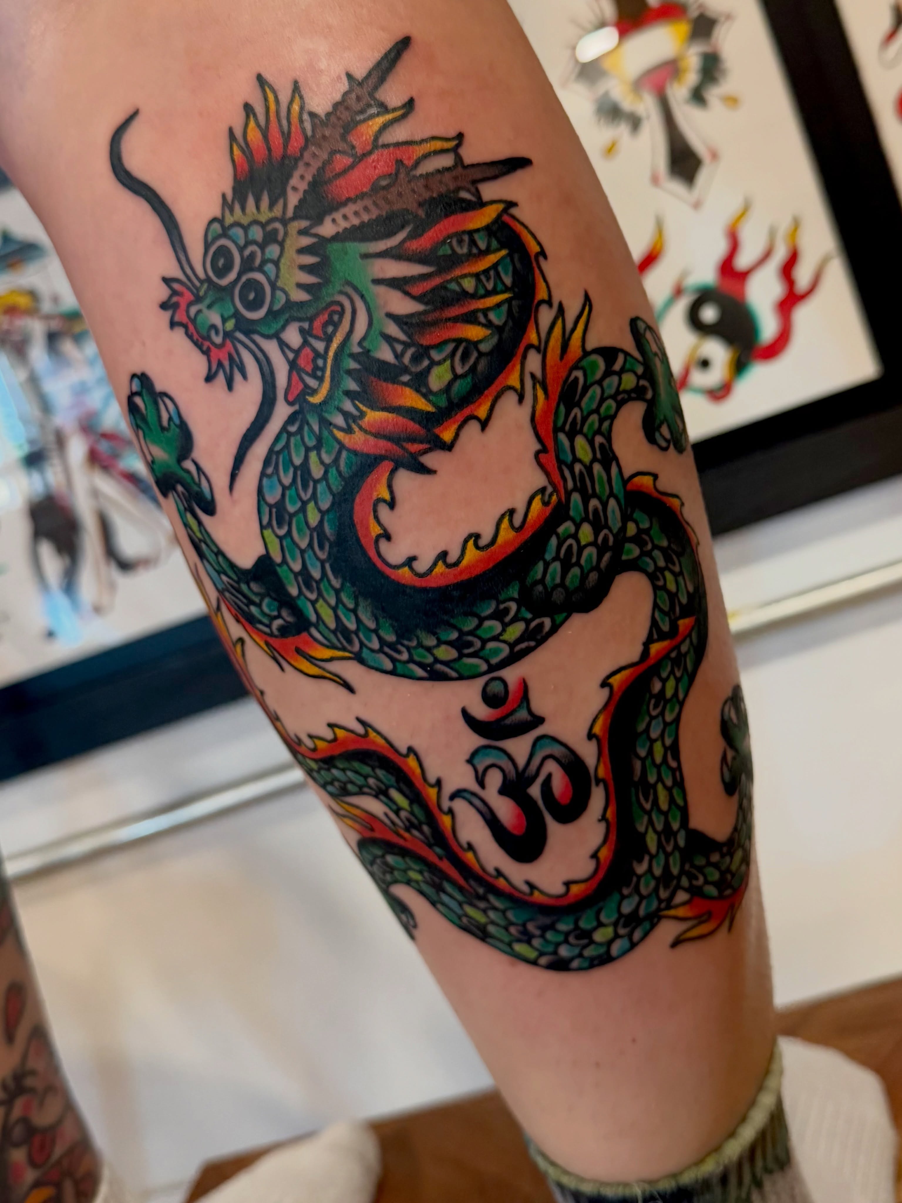 Dragon American traditional tattoo on the thigh by Steven
