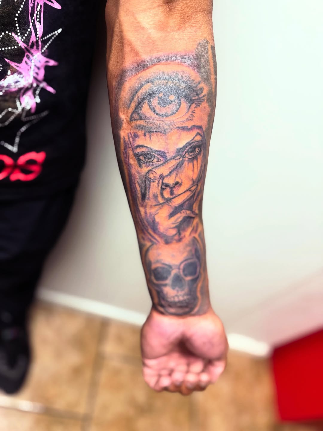 All-seeing eye and skull realism tattoo on the forearm by Uncle Fade Tattoo Artist ✍🏾