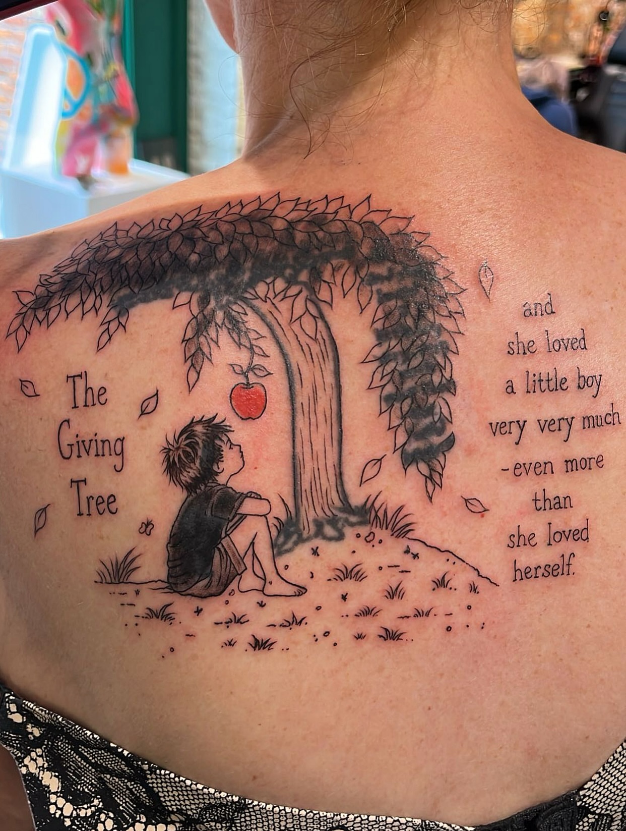 The Giving Tree realism tattoo on the back by Elle Miller
