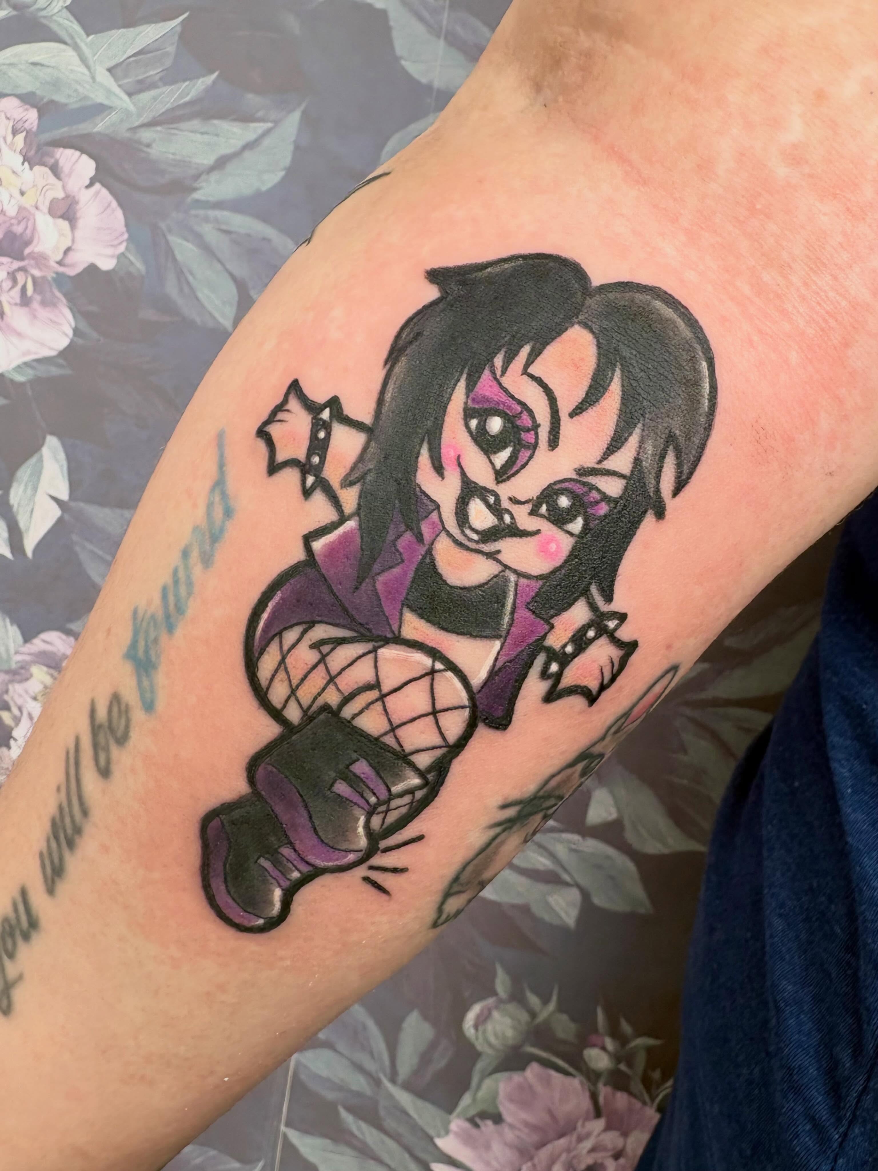 Chibi character anime tattoo on the forearm by Bre Alex