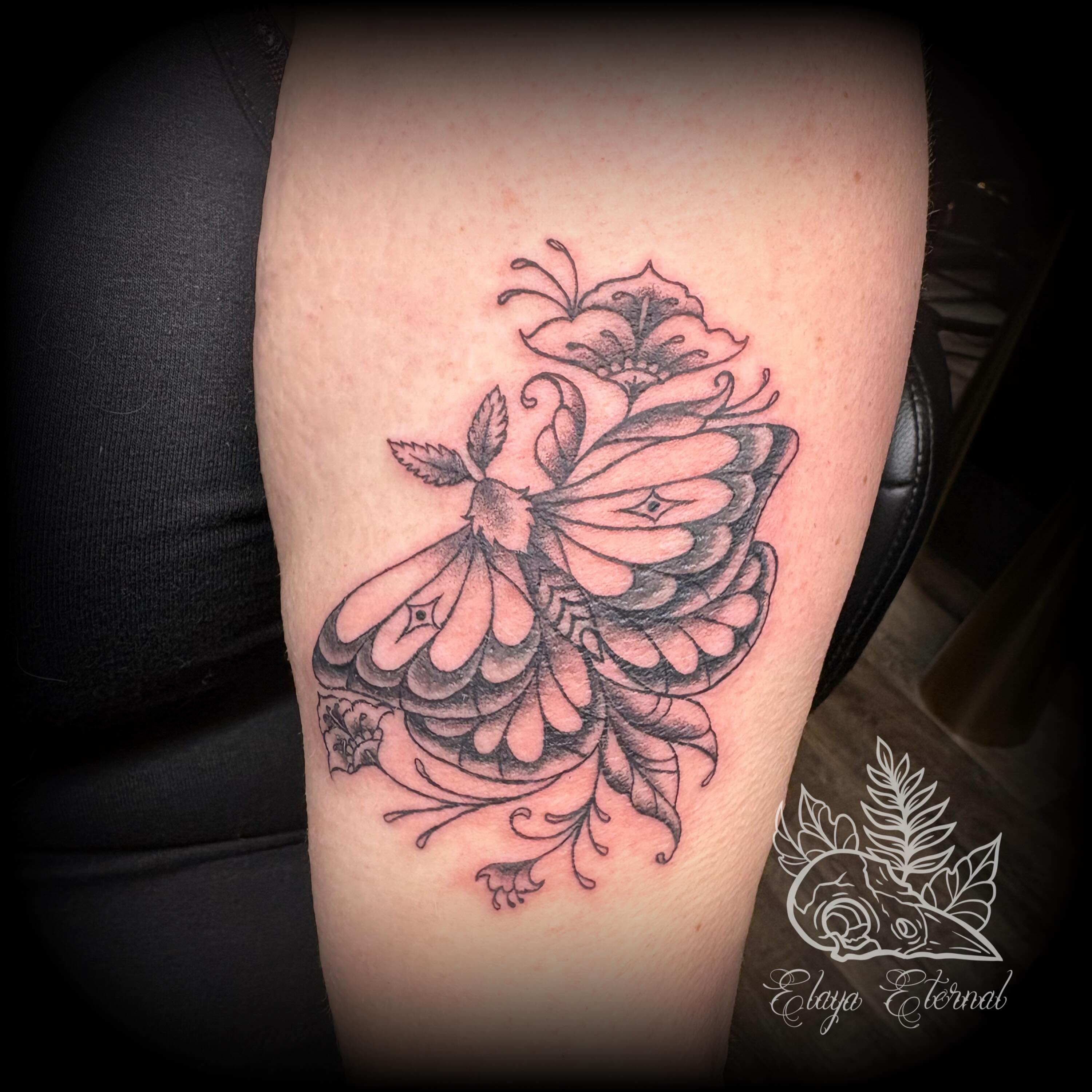 Tattoo by @elaya.tattoo.artistry — black_and_grey