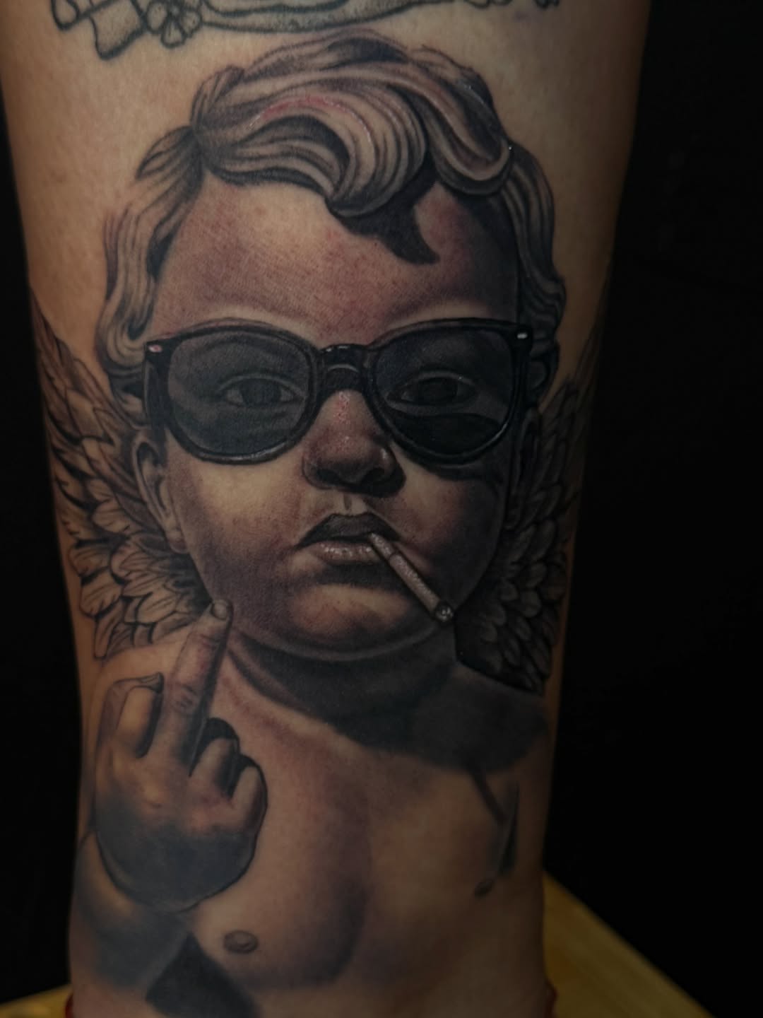 Tattoo by @elian.tattoos — realism, black_and_grey