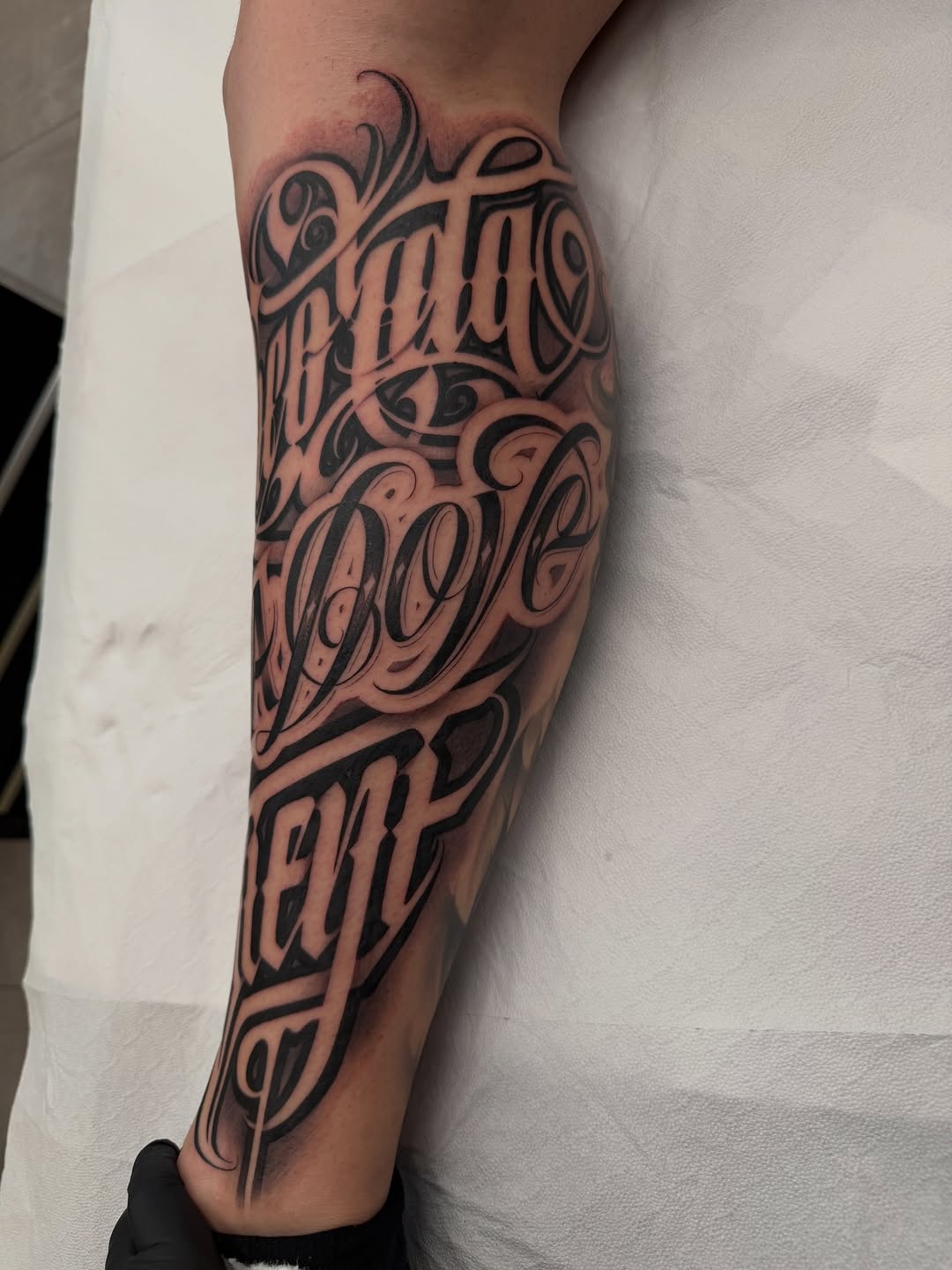 Tattoo by @angelstat2 — lettering_script, chicano