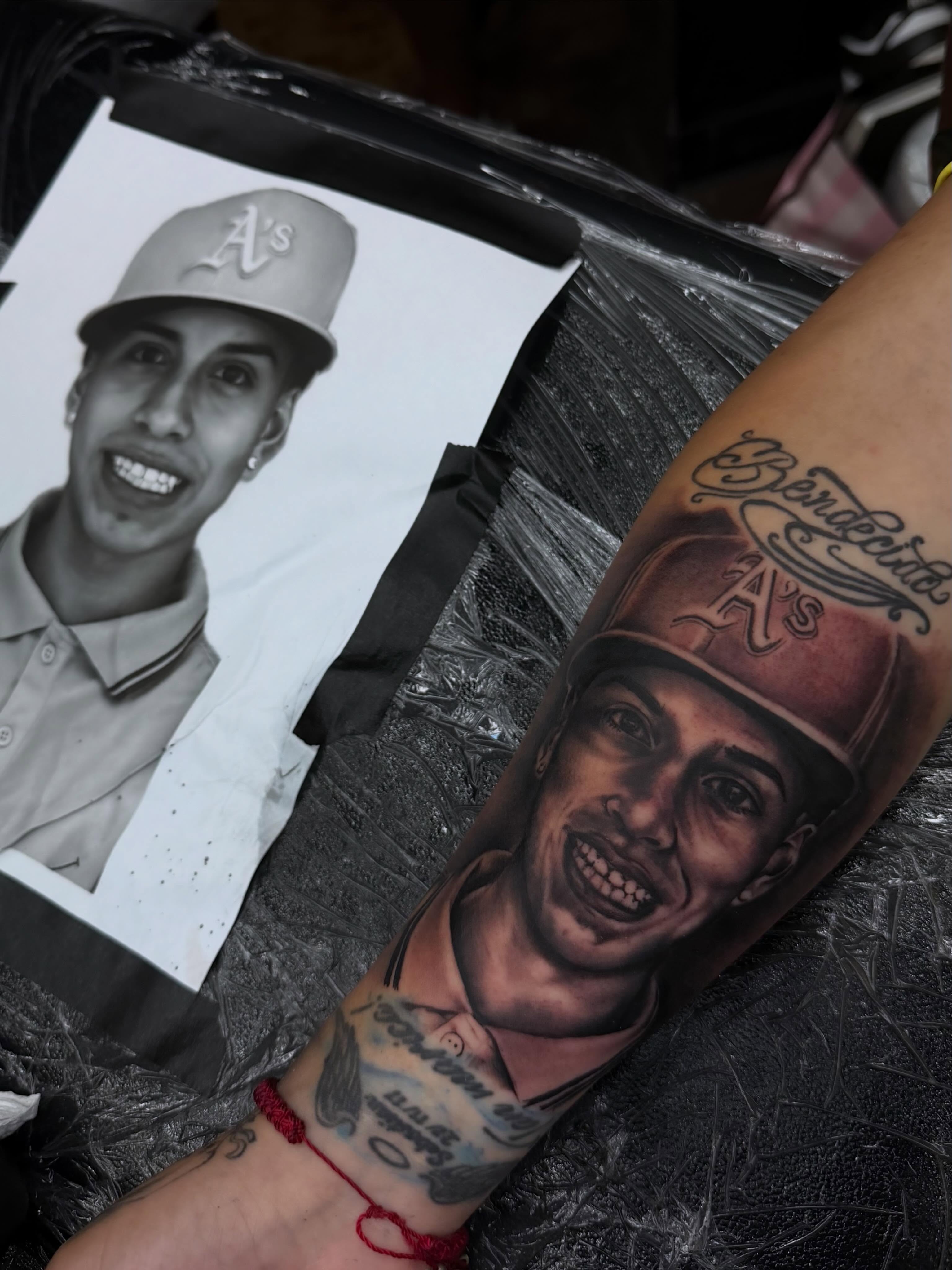 Portrait realism tattoo on the forearm by Lu Ve, Dayton, Ohio