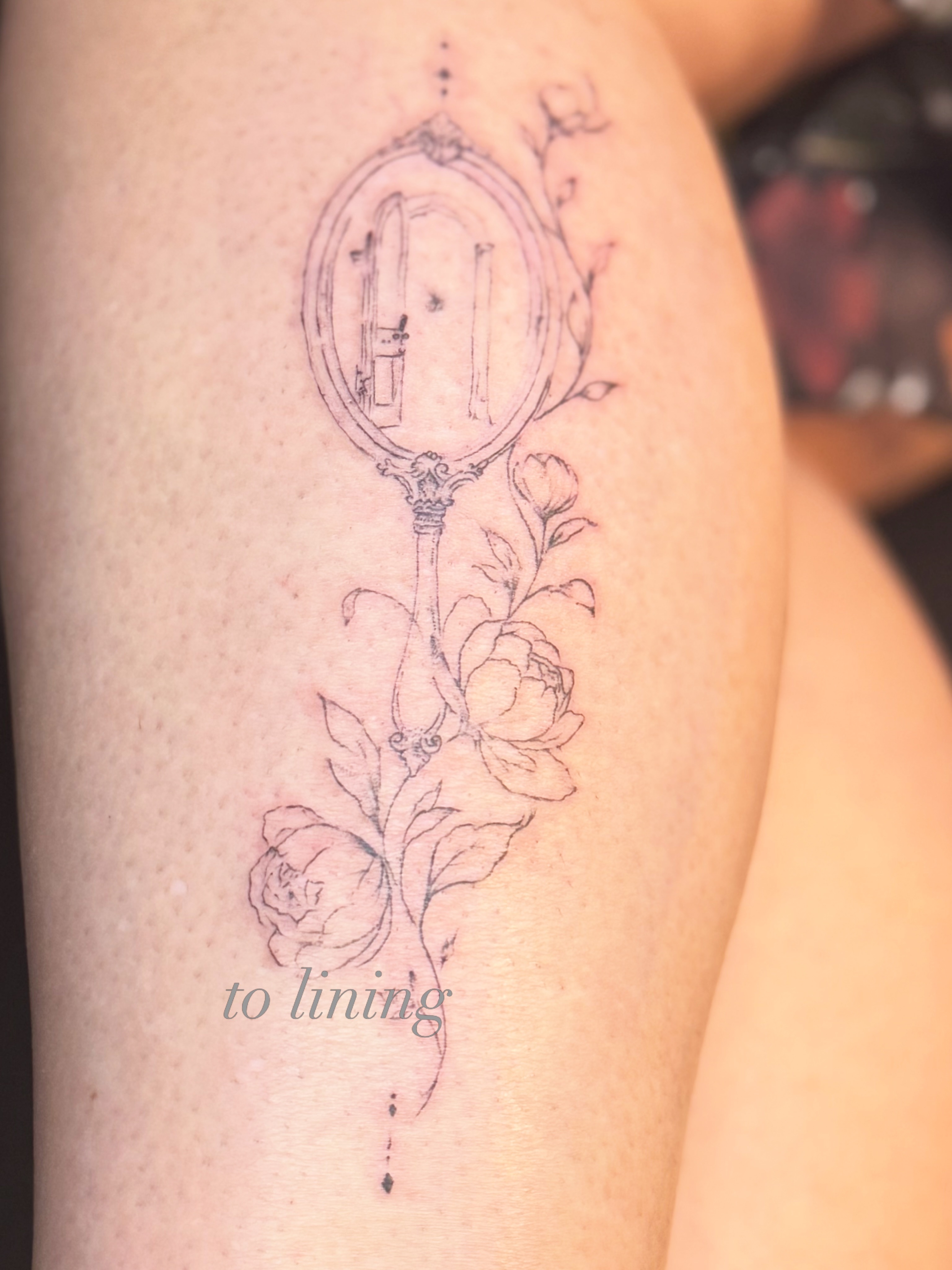 Mirror and roses black and grey tattoo on the thigh by Meagan, Charlotte, North Carolina