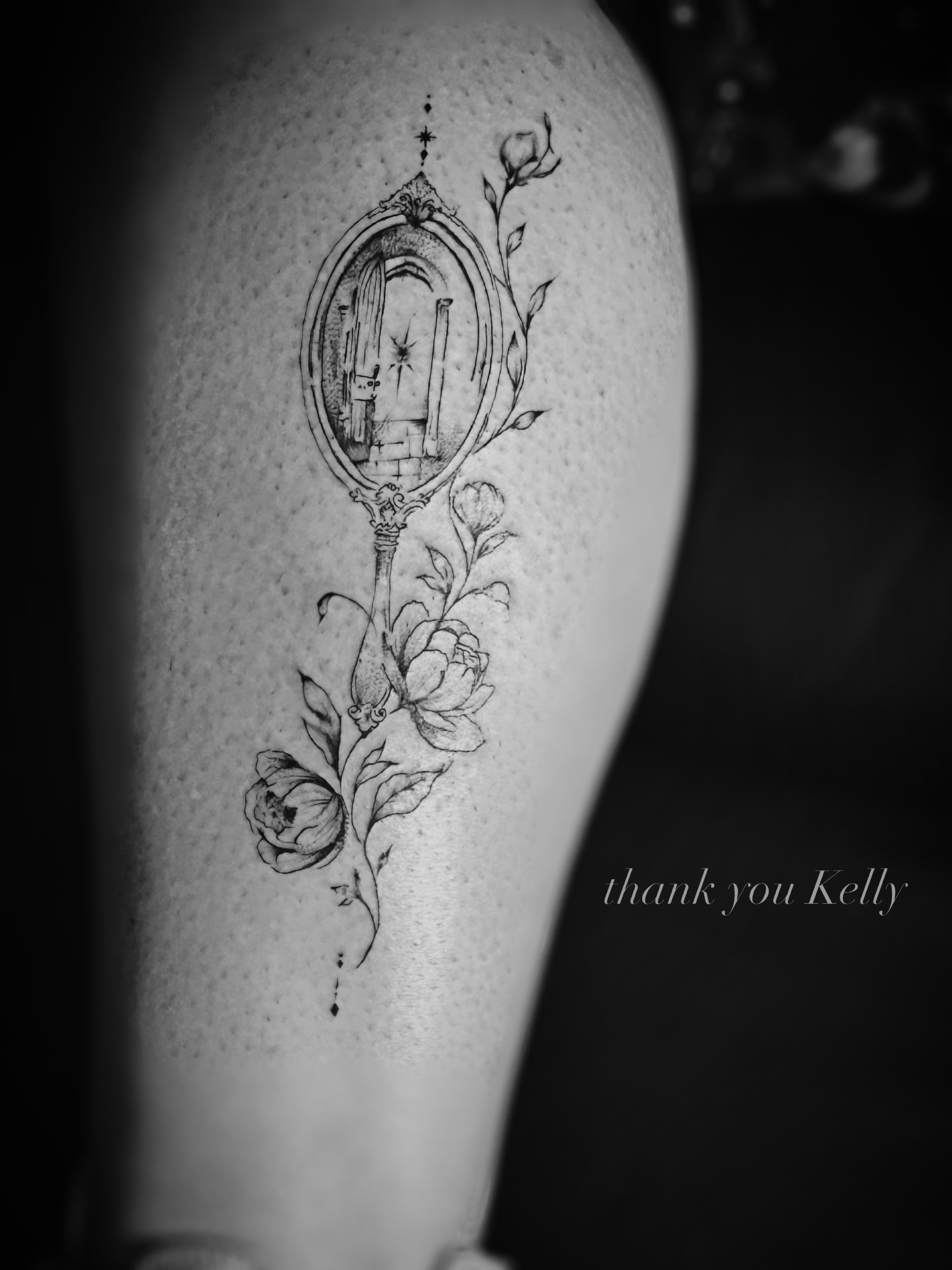 Mirror and floral ornamental tattoo on the forearm by Meagan, Charlotte, North Carolina