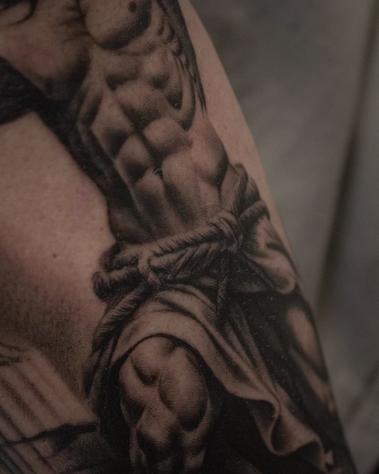 Muscular torso realism tattoo on the chest by Erik Bonilla