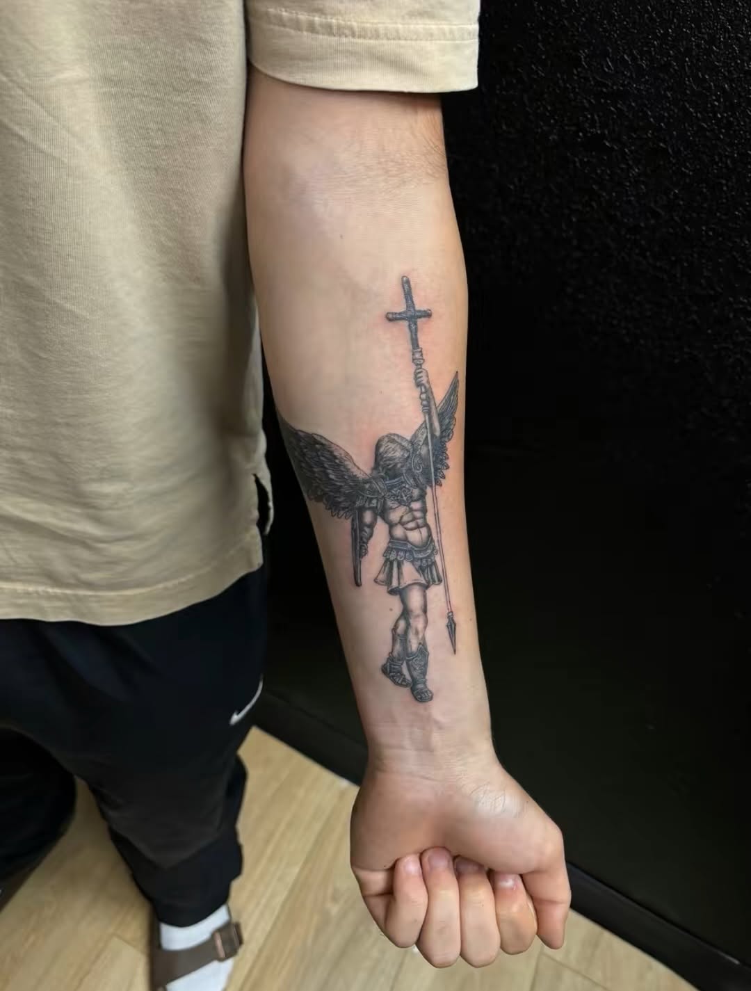 Angel with sword and cross realism tattoo on the forearm by JT.tattoos