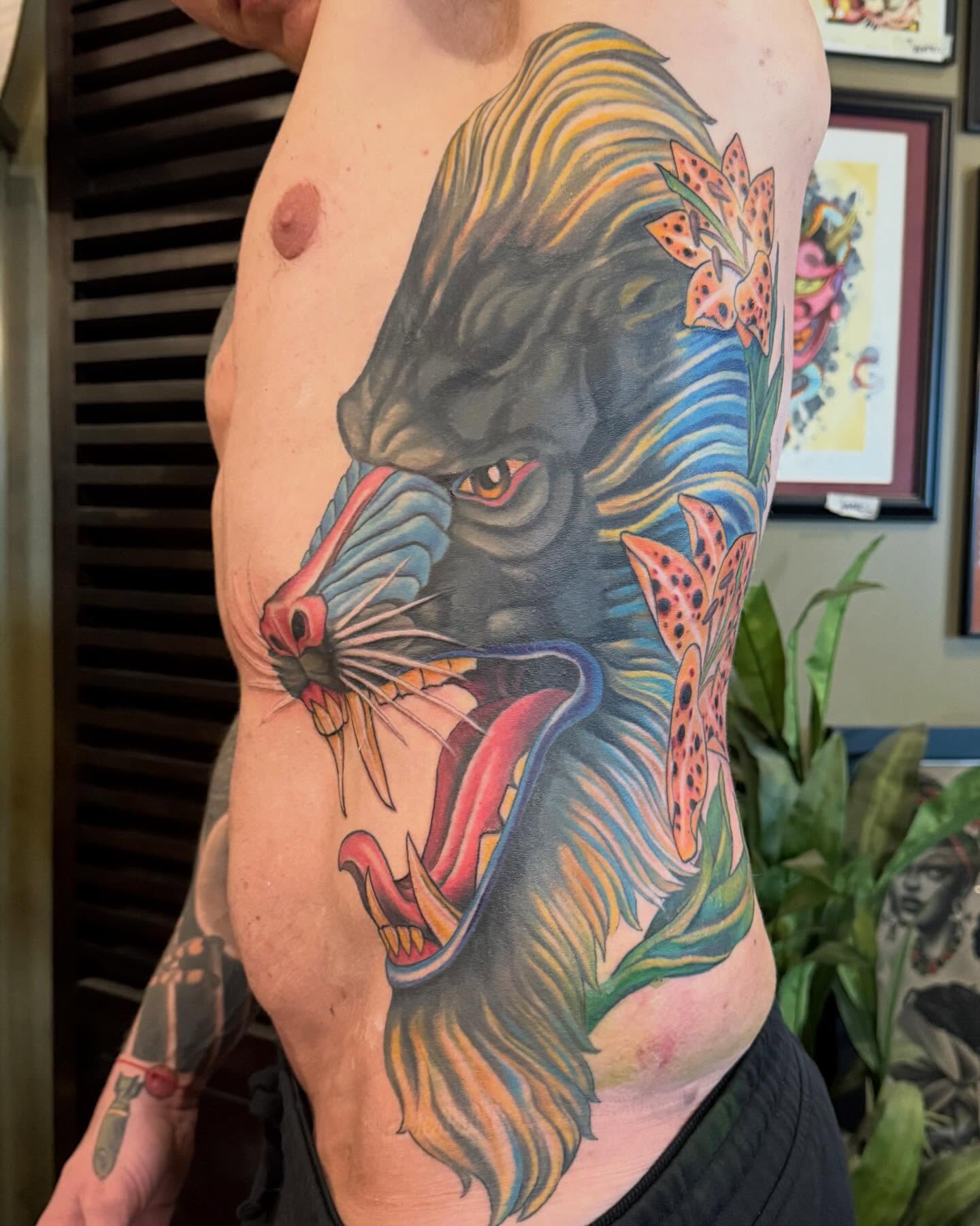 Panther American traditional tattoo on the ribs by Jesse Gray