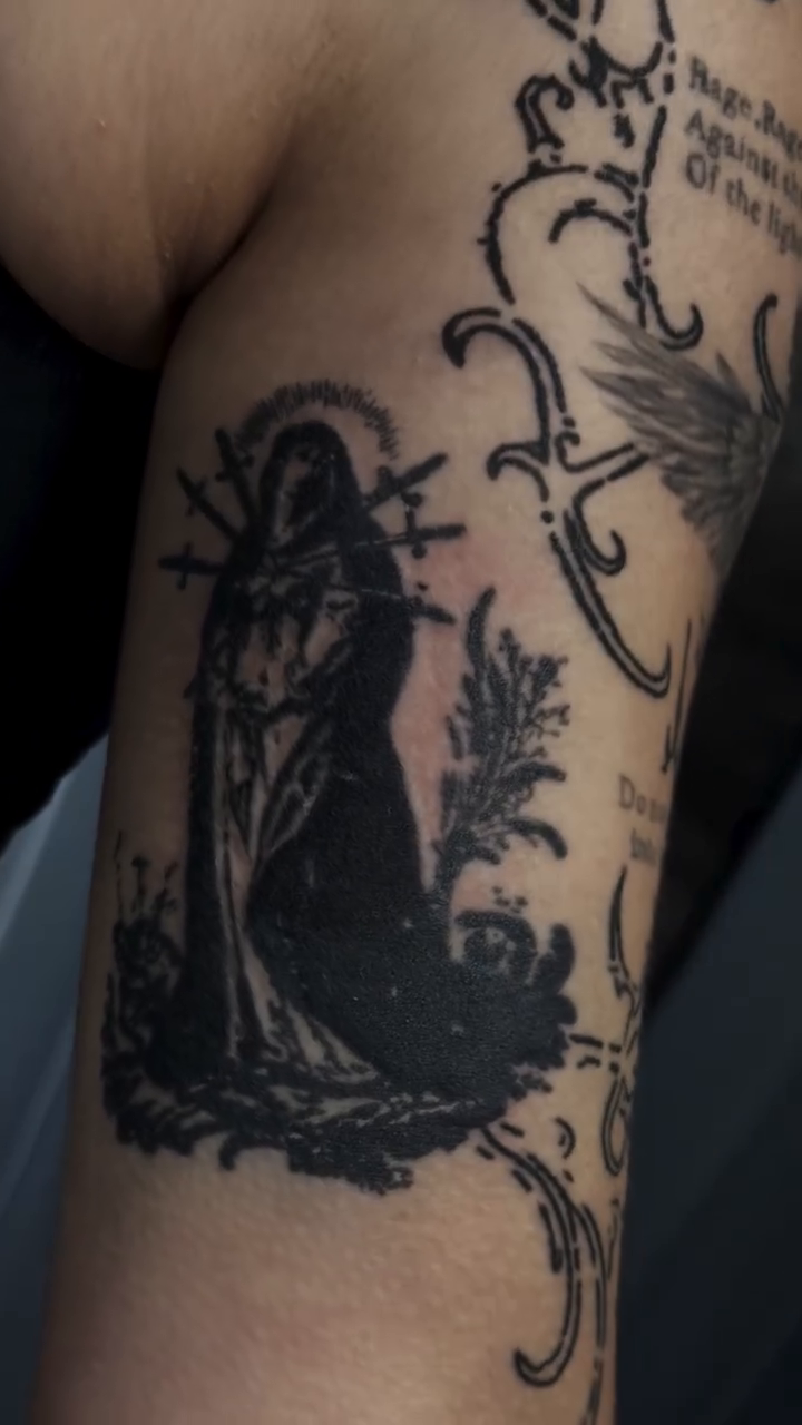 Sketch tattoo on the upper arm by Raciel Fabian Romero