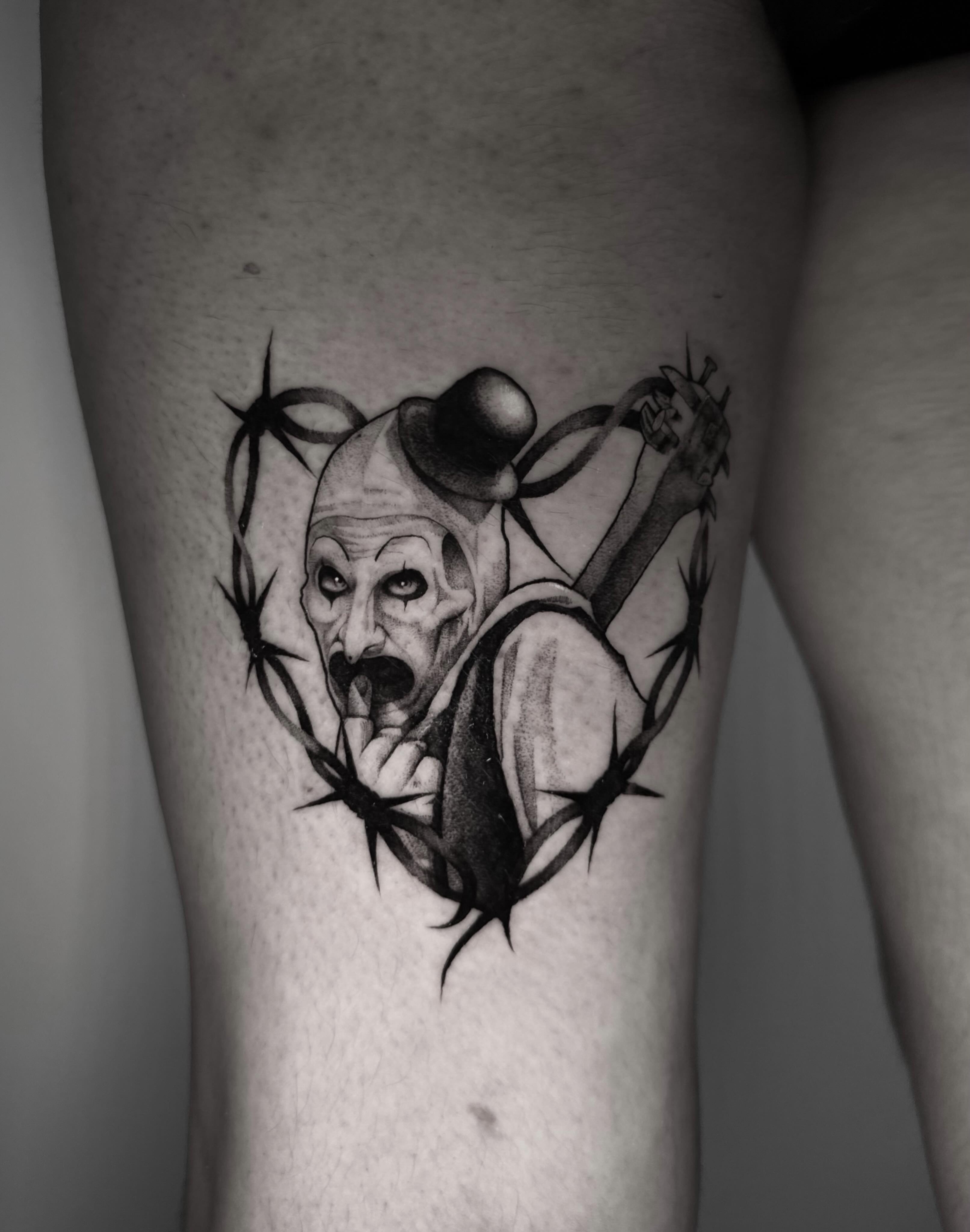 Clown black and grey tattoo on the thigh by ππππππ