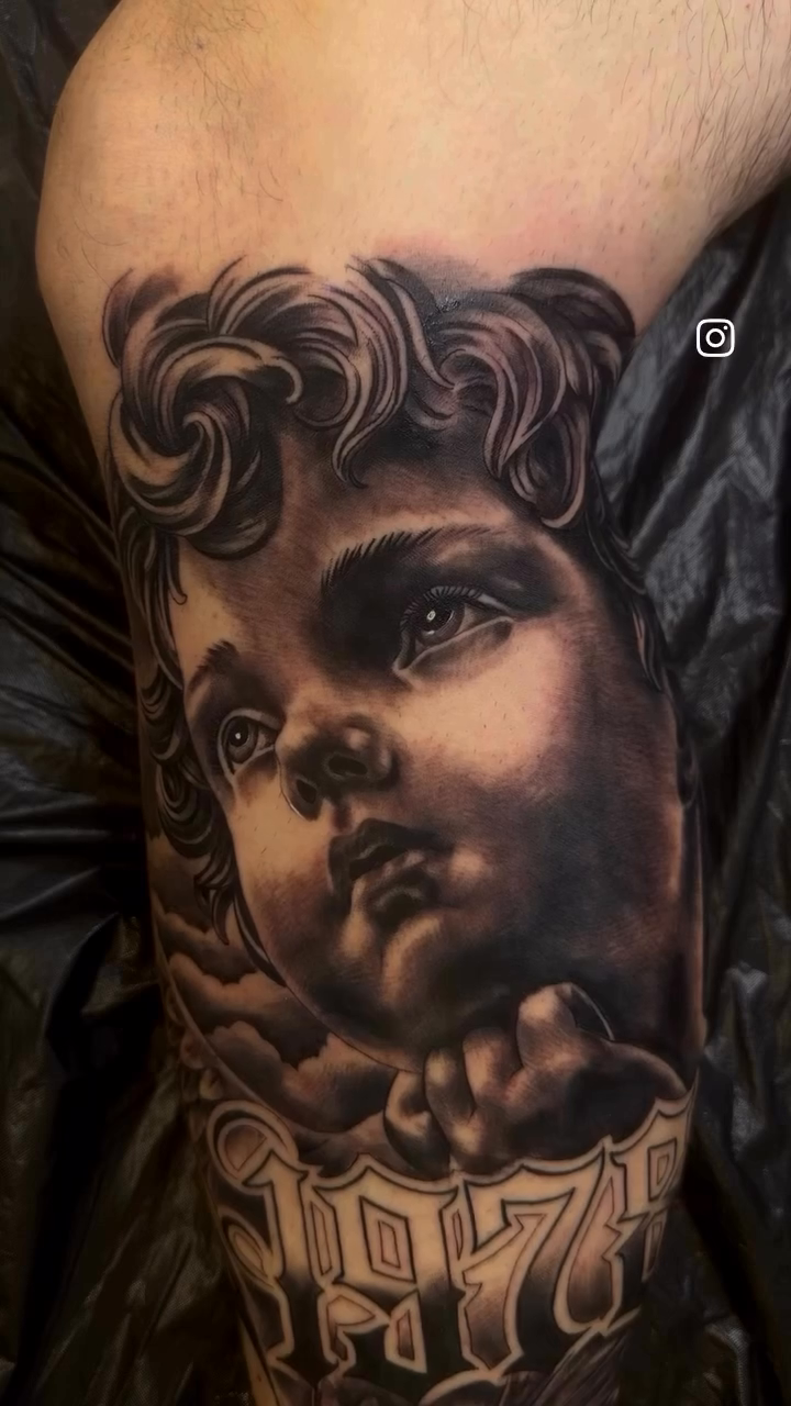 Cherub portrait tattoo realism tattoo on the forearm by Tattoos By Josh