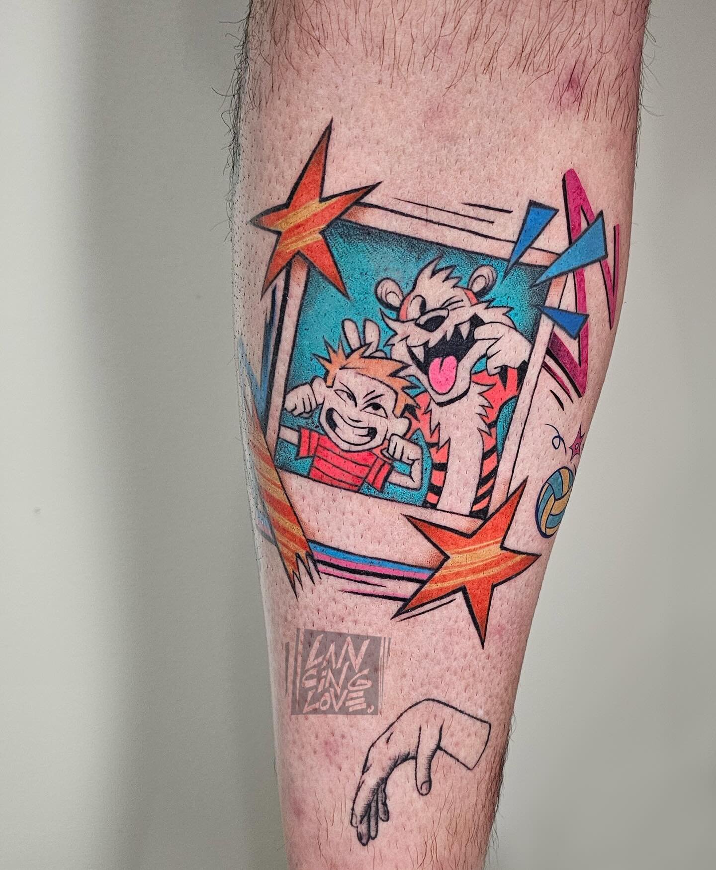 Calvin and Hobbes American traditional tattoo on the forearm by Lancinglove