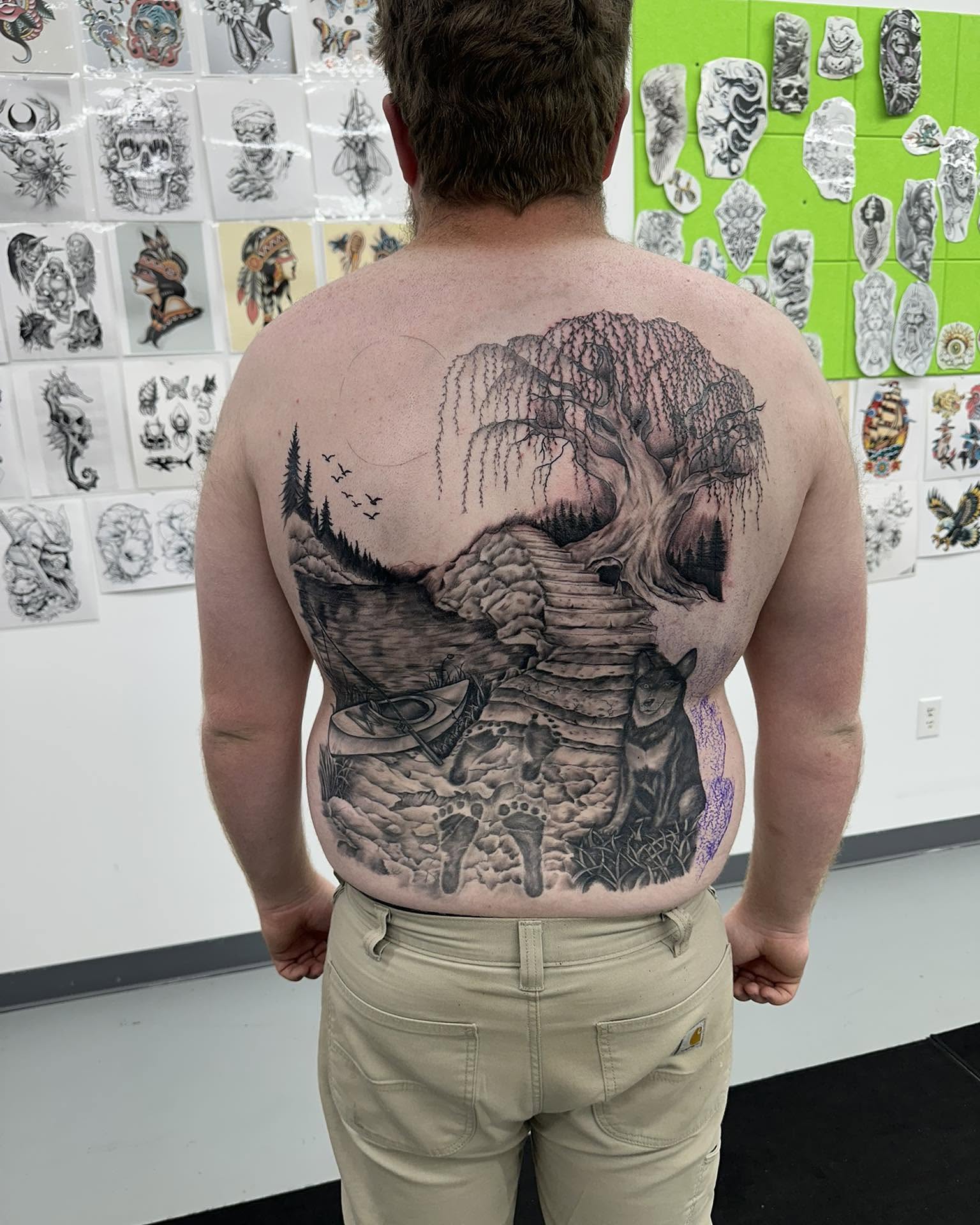 Tree and landscape realism tattoo on the back by Brian Lambert