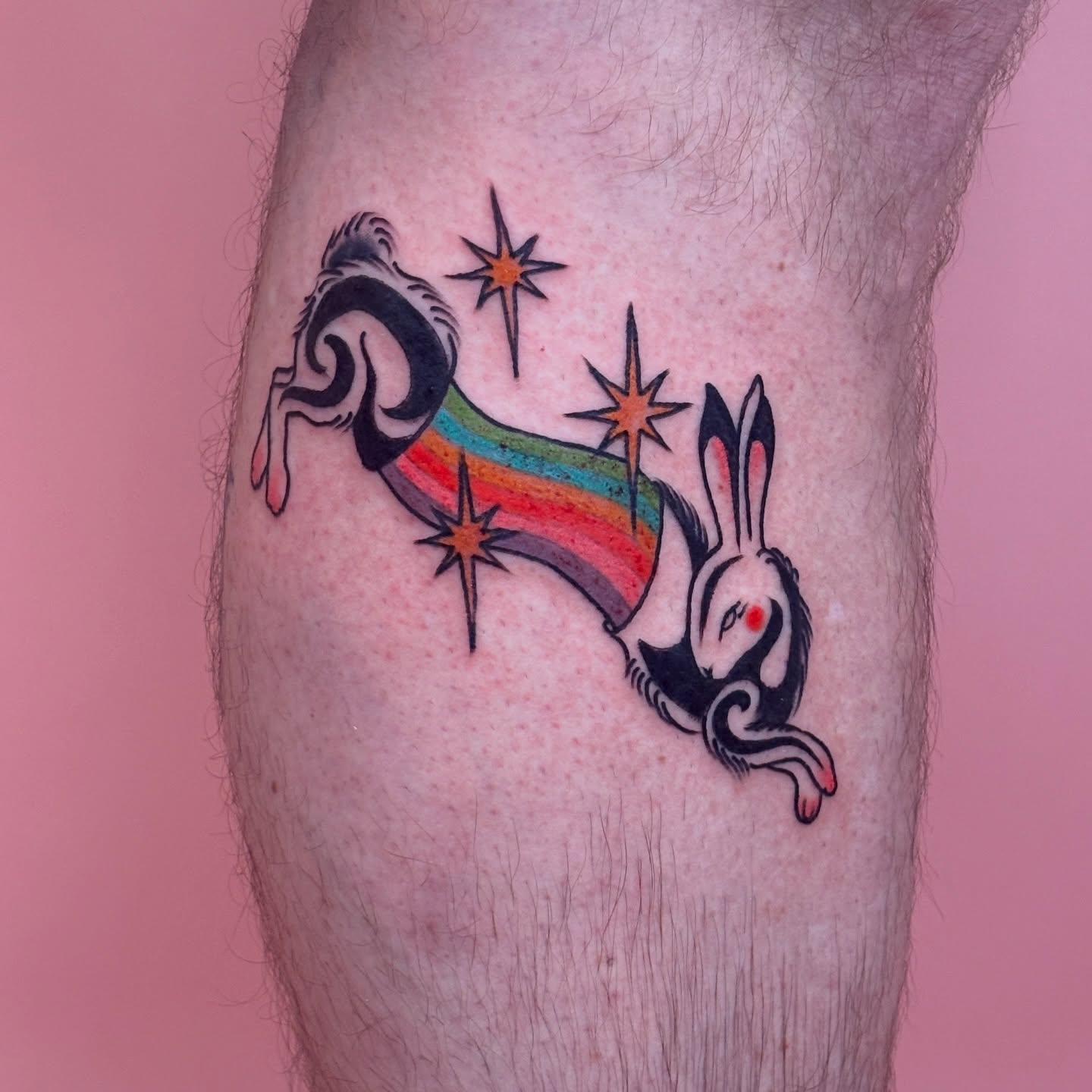 Rabbit with rainbow new school tattoo on the forearm by Car🦋🌈 Dallas Tattoo Artist💖