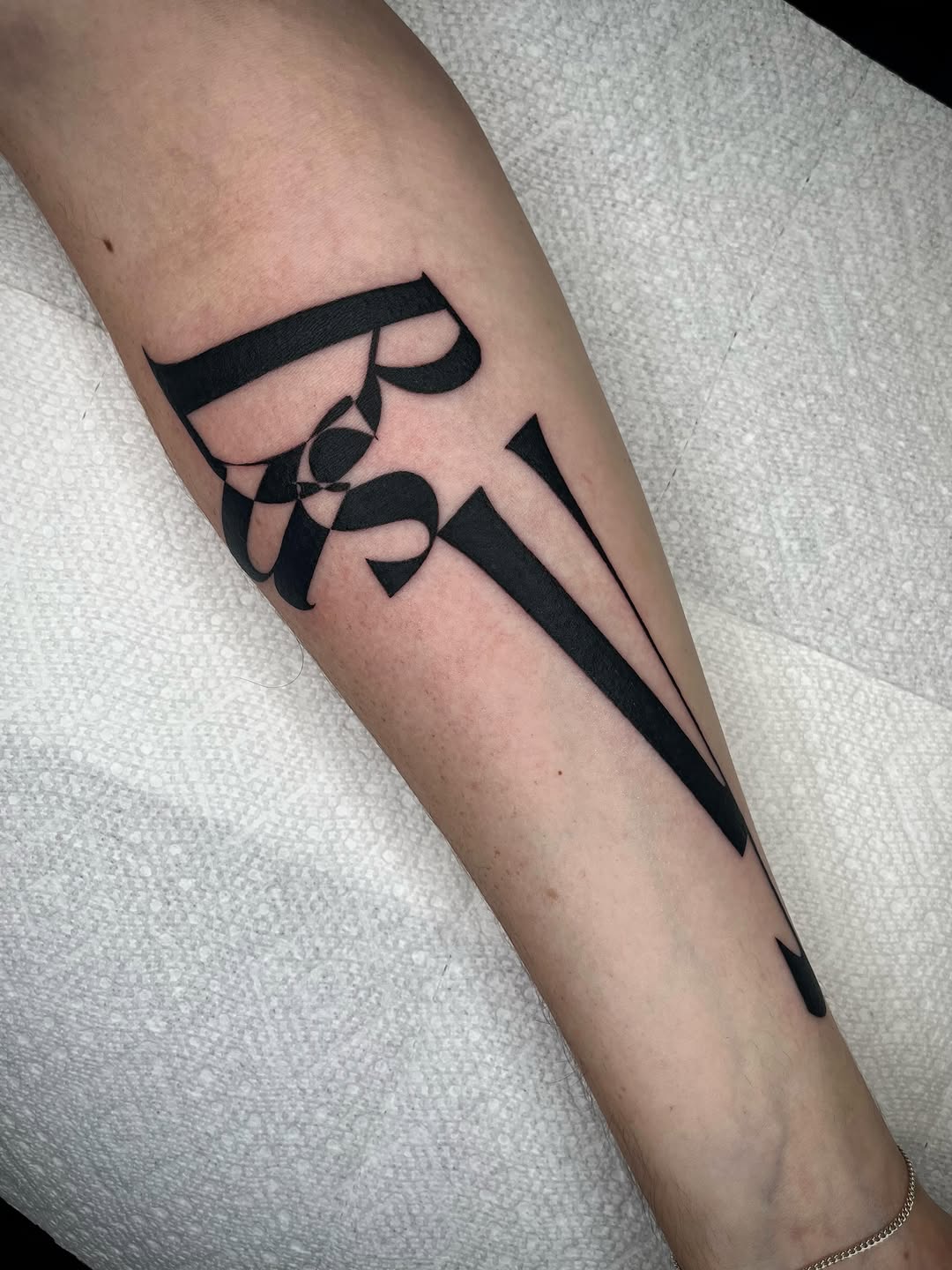 Tattoo by @zaktats — lettering_script, blackwork