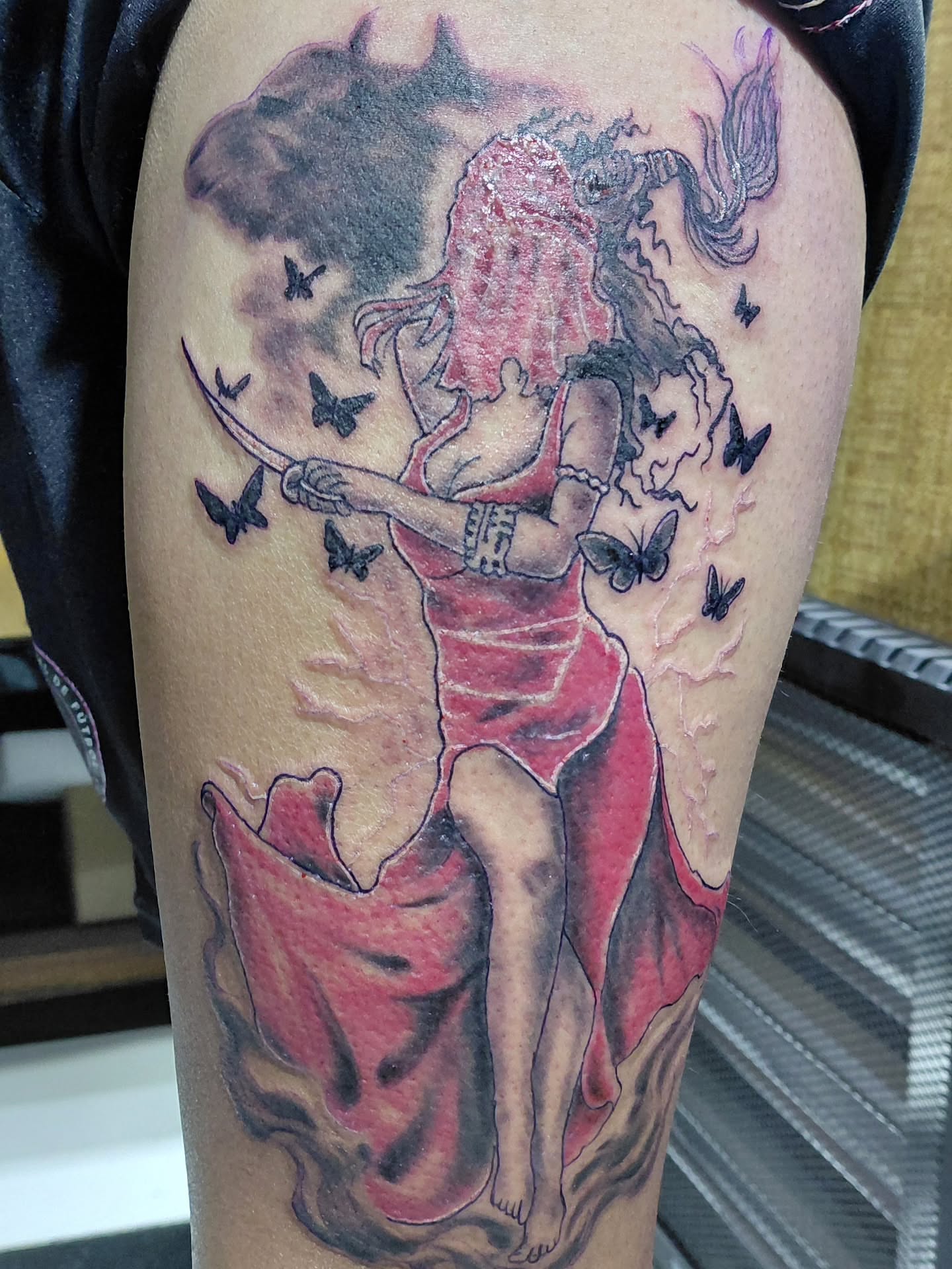 Dancer with butterflies realism tattoo on the thigh by Jose Rodriguez