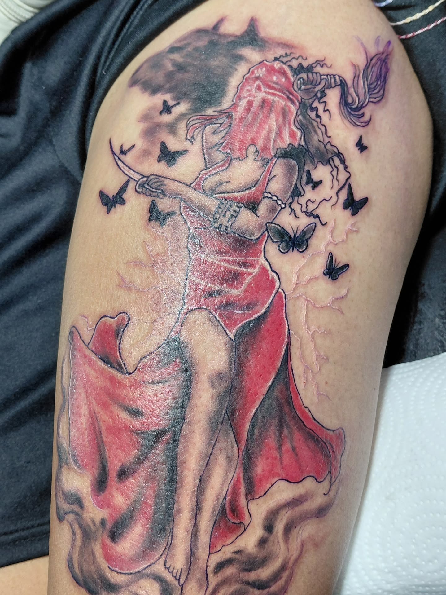 Dancer with butterflies realism tattoo on the thigh by Jose Rodriguez