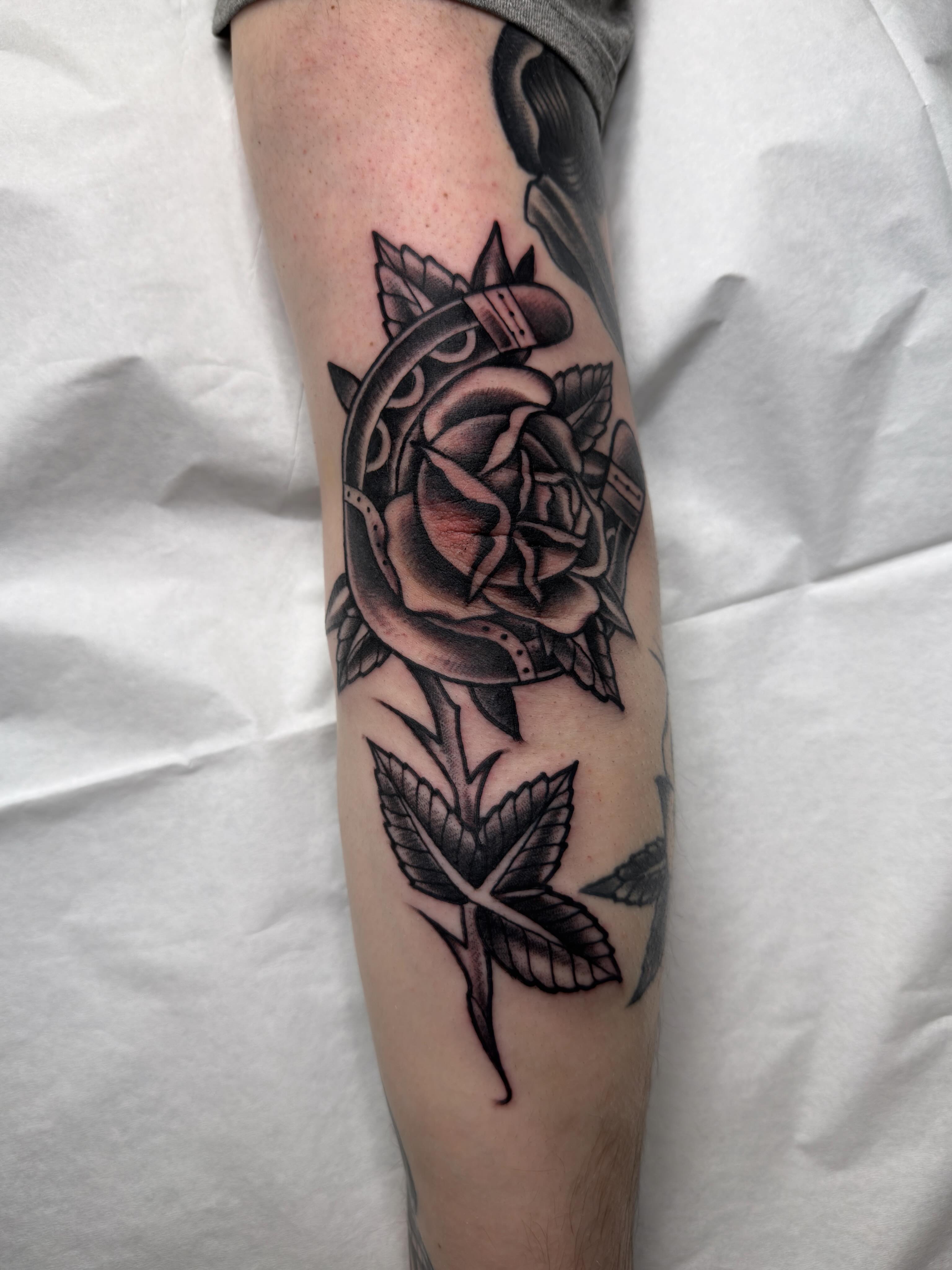 Rose with crown American traditional tattoo on the forearm by Trav, Bayville, New Jersey